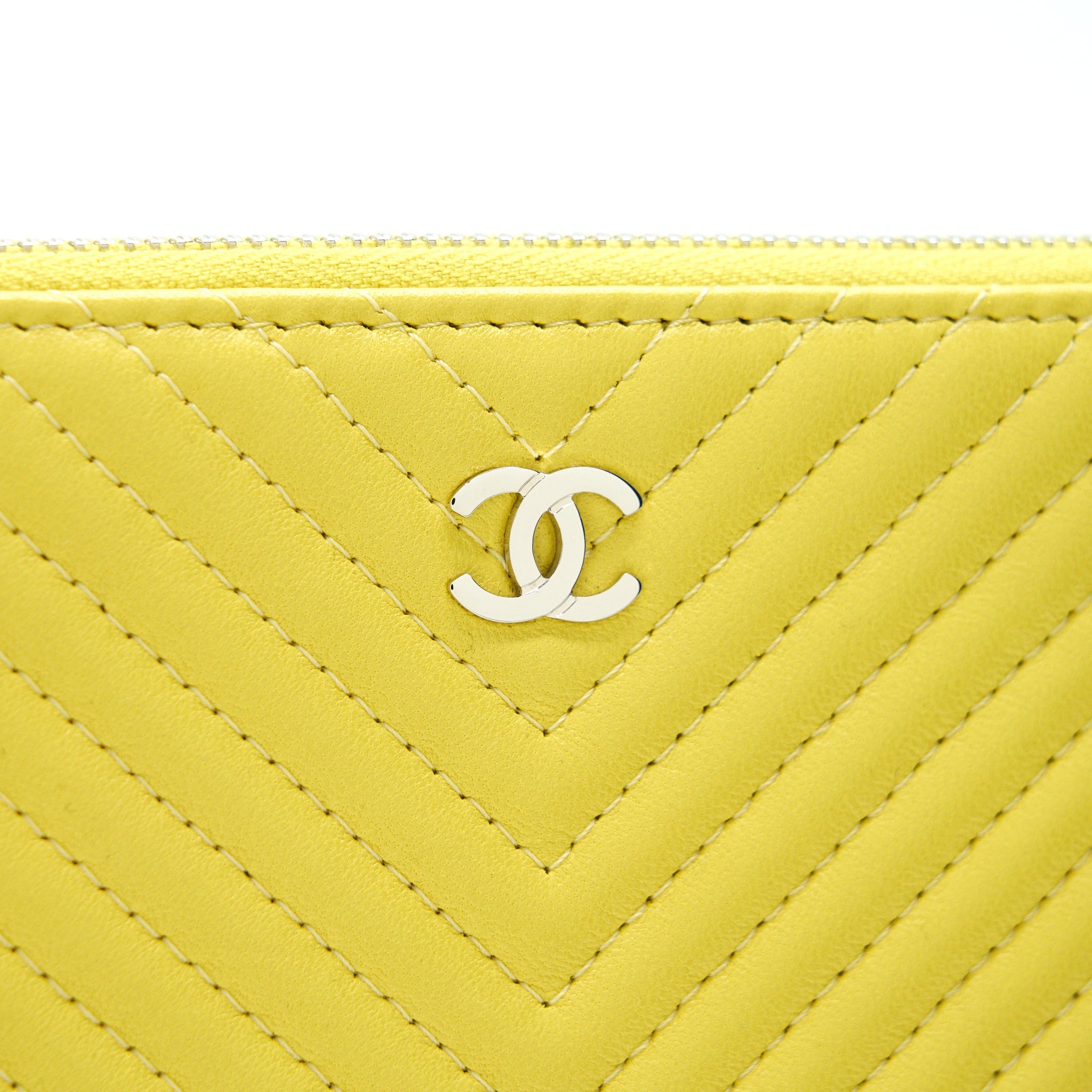 CHANEL CHEVRON CLUTCH BAG IN YELLOW SHW