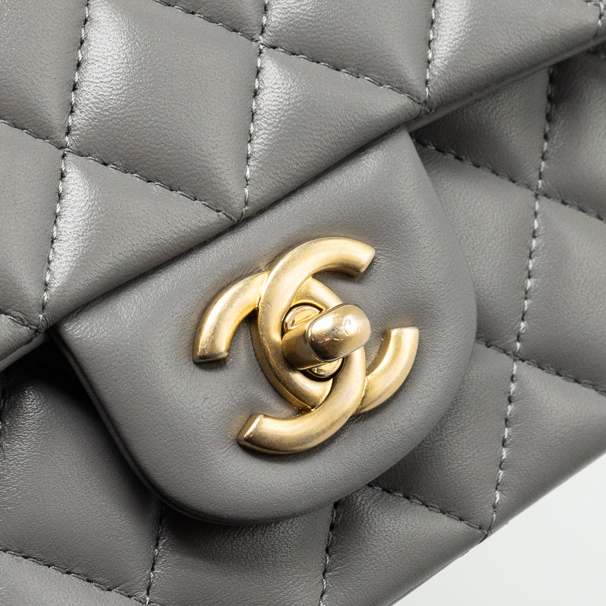 CHANEL 22K METAL TOP HANDLE MINI RECTANGULAR FLAP BAG LAMBSKIN GREY GHW (MICROCHIP)