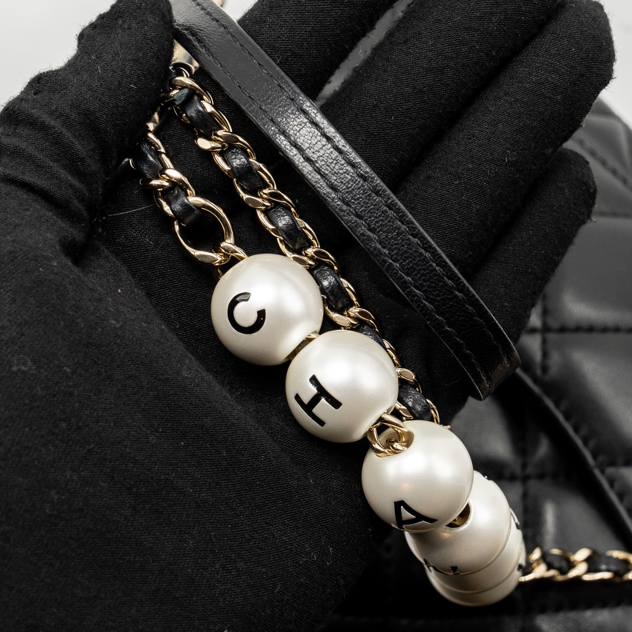 CHANEL QUILTED FLAP BAG WITH PEARL CHAIN LAMBSKIN BLACK LGHW