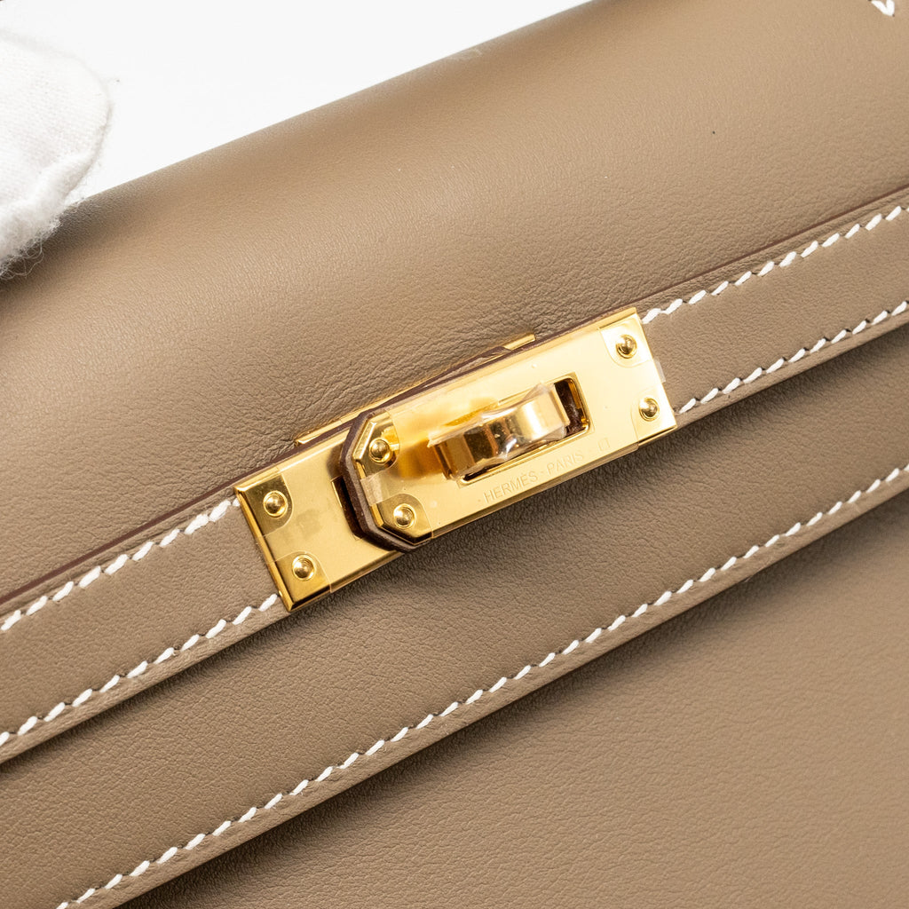 HERMES KELLY POCHETTE SWIFT ETOUPE GHW