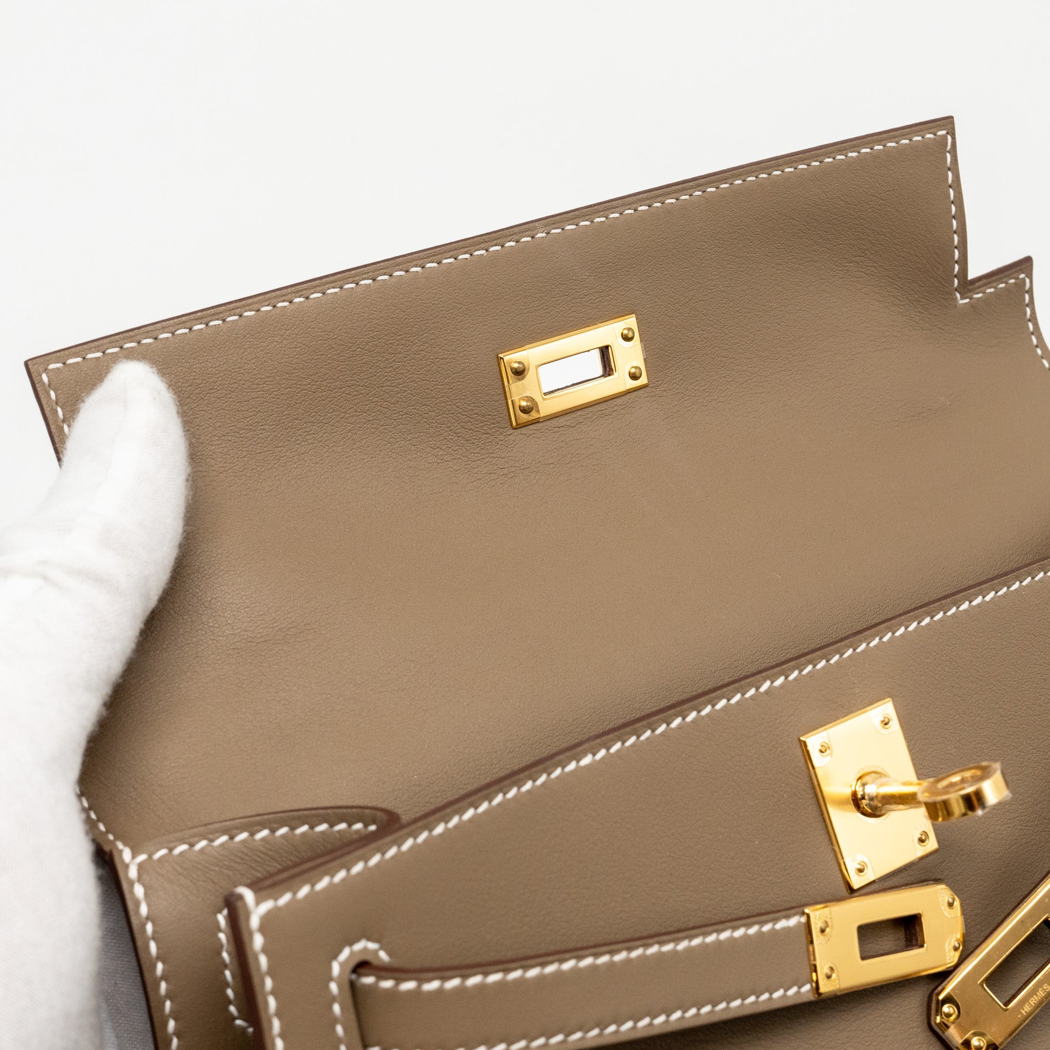 HERMES KELLY POCHETTE SWIFT ETOUPE GHW