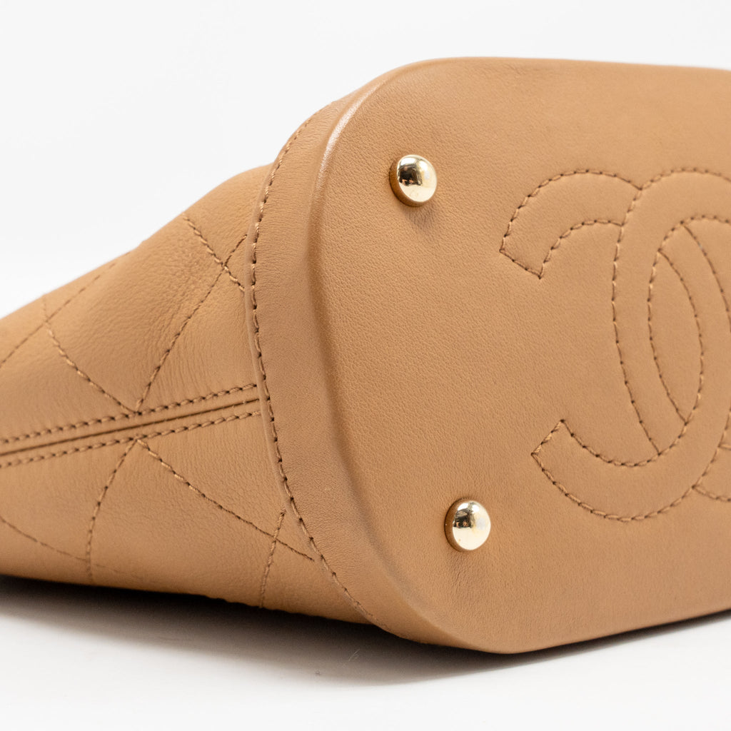 CHANEL MINI DRAWSTRING BUCKET BAG CALFSKIN DARK BEIGE LGHW
