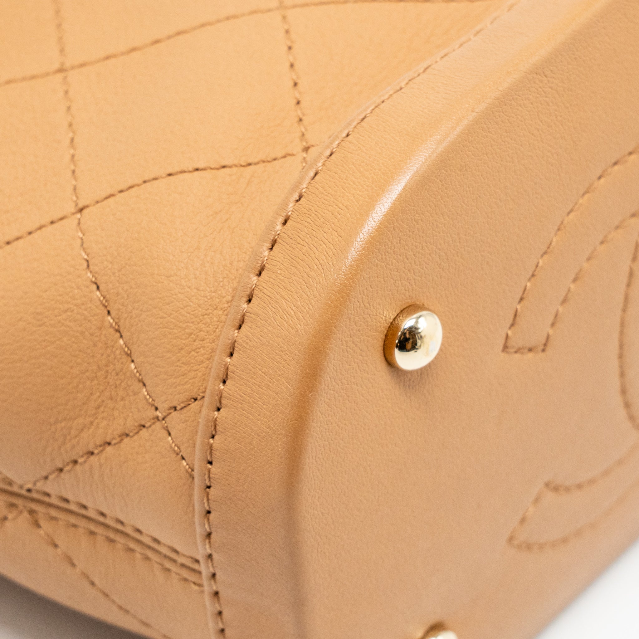 CHANEL MINI DRAWSTRING BUCKET BAG CALFSKIN DARK BEIGE LGHW