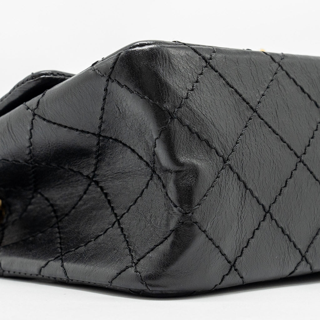 CHANEL MINI 2.55 REISSUE FLAP BAG AGED CALFSKIN BLACK GHW
