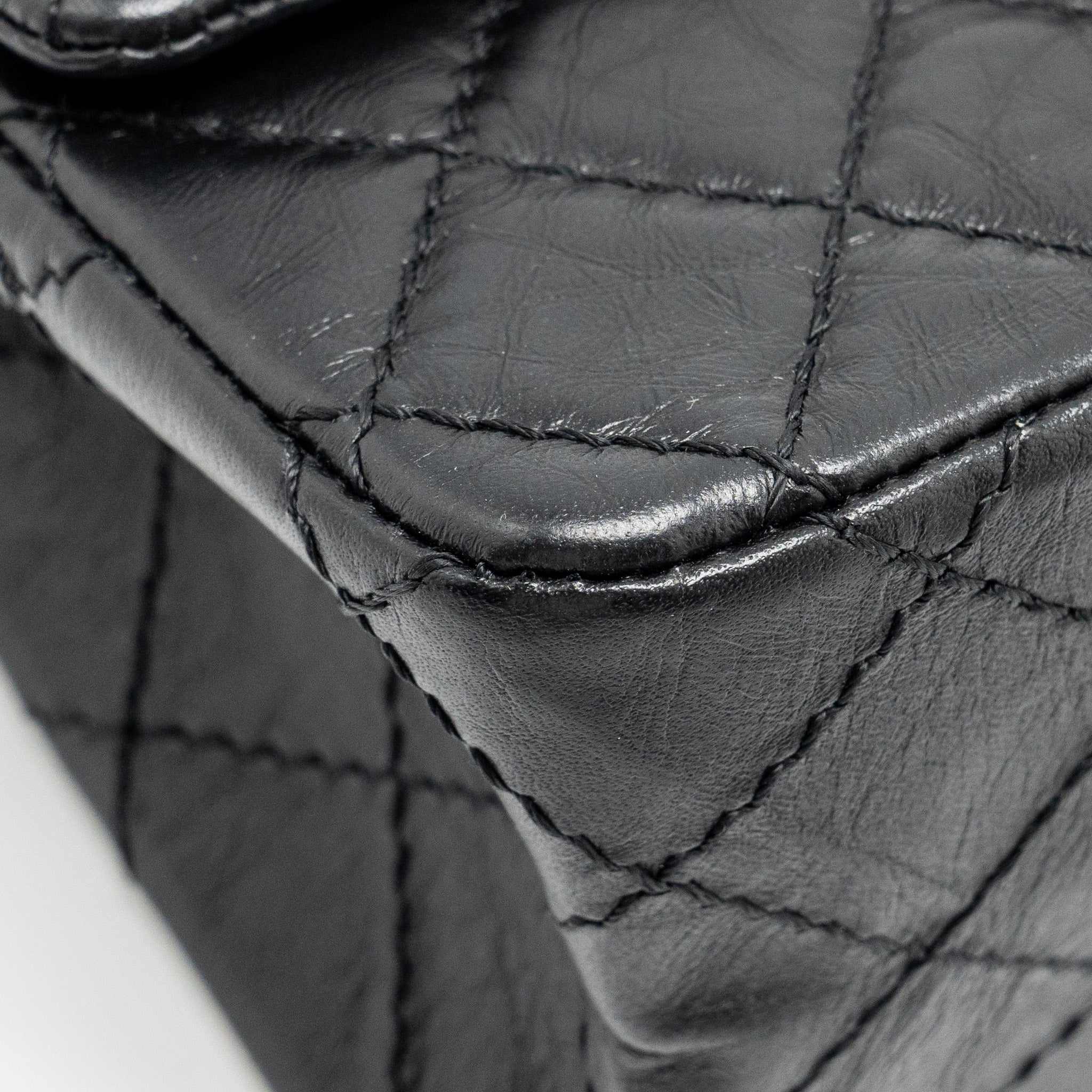 CHANEL MINI 2.55 REISSUE FLAP BAG AGED CALFSKIN BLACK GHW