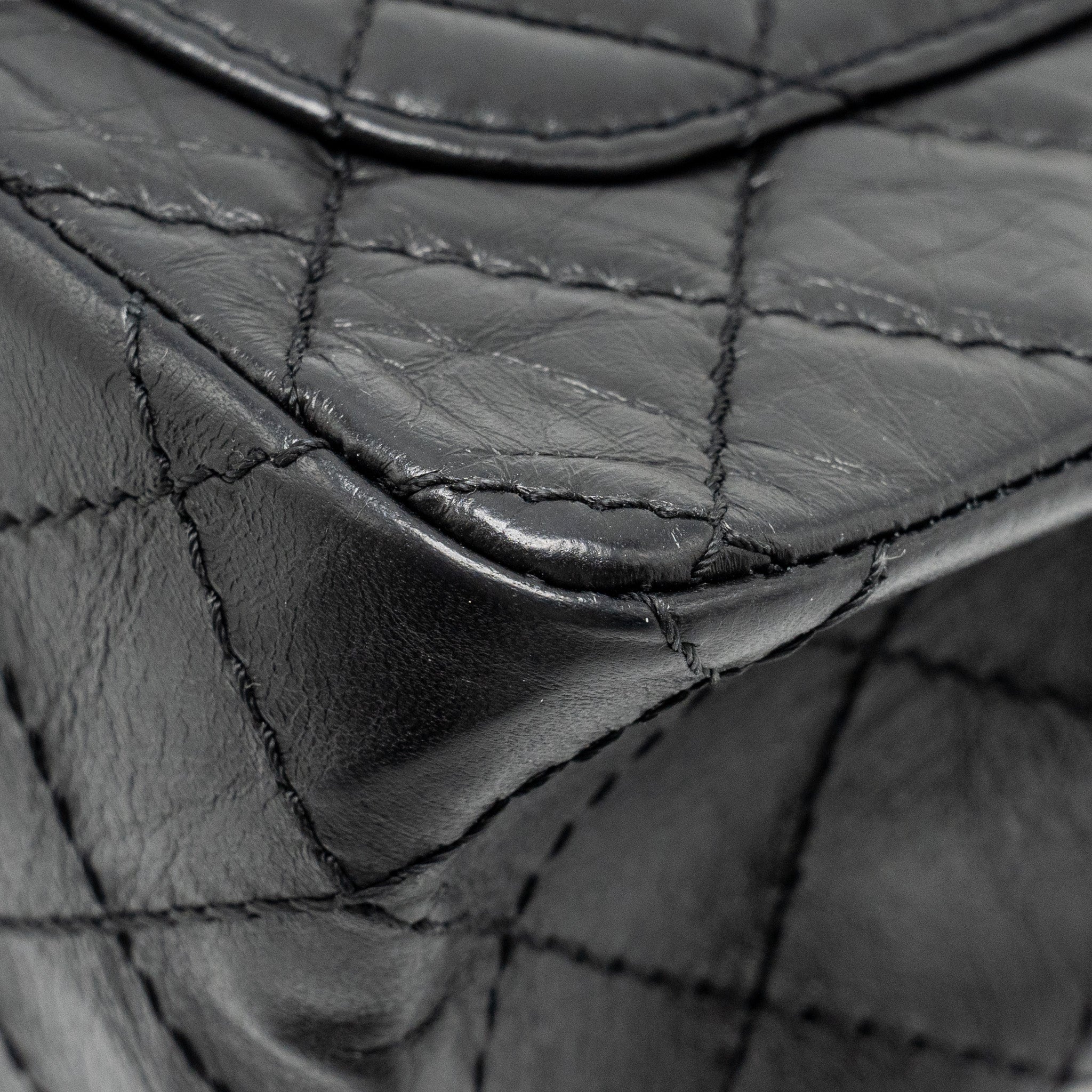 CHANEL MINI 2.55 REISSUE FLAP BAG AGED CALFSKIN BLACK GHW
