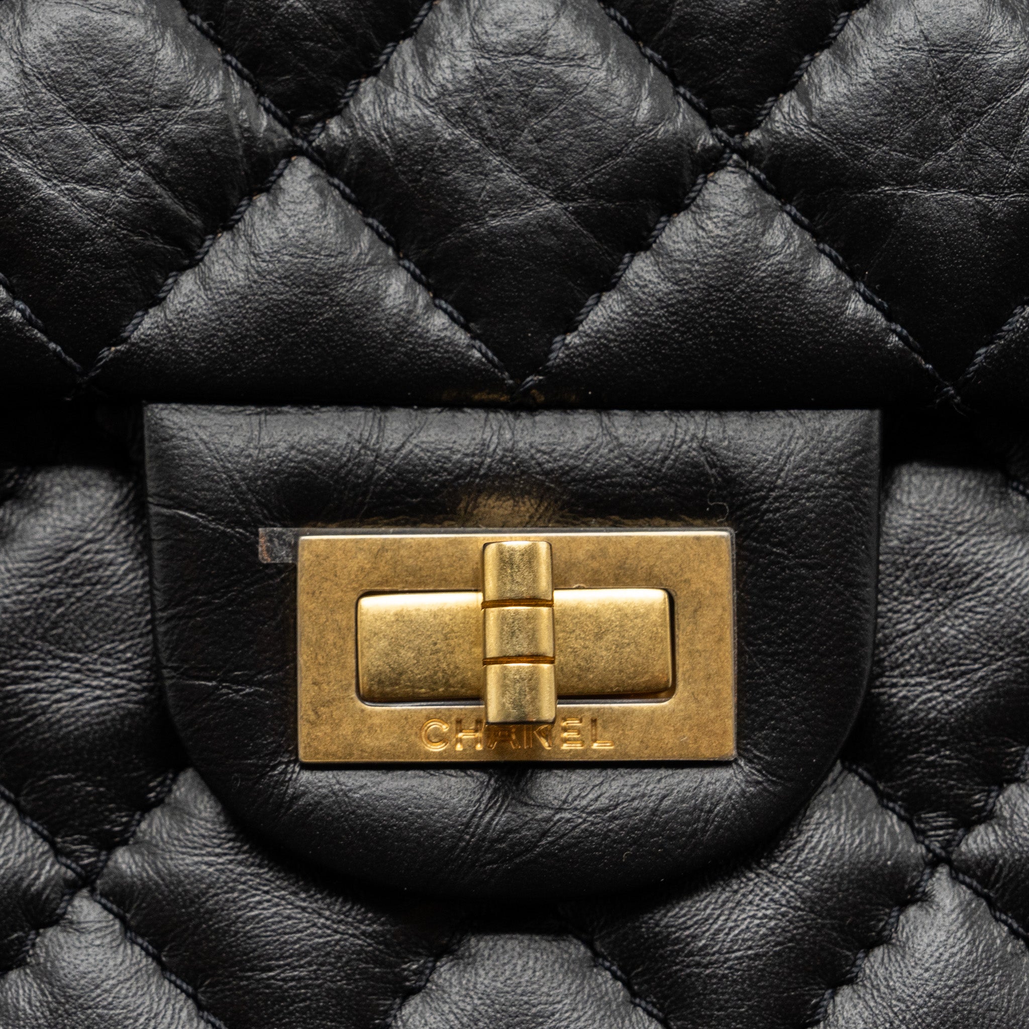 CHANEL MINI 2.55 REISSUE FLAP BAG AGED CALFSKIN BLACK BRUSHED GHW (MICROCHIP)