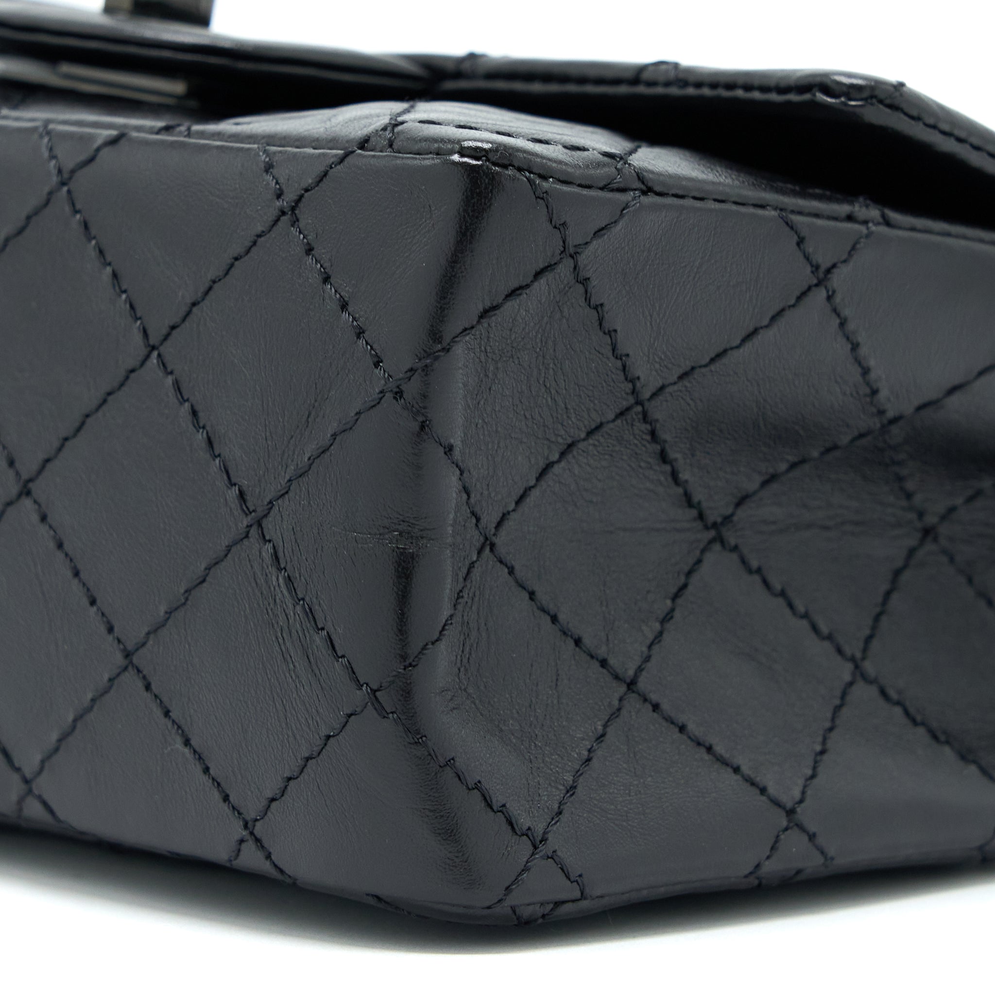 CHANEL MINI 2.55 REISSUE AGED CALFSKIN SO BLACK WITH BLACK HARDWARE (MICROCHIP)