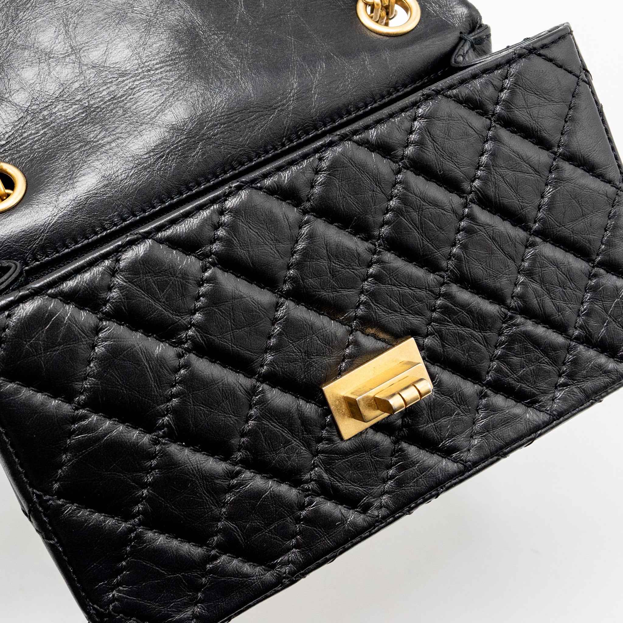 CHANEL MINI 2.55 REISSUE FLAP BAG AGED CALFSKIN BLACK GHW