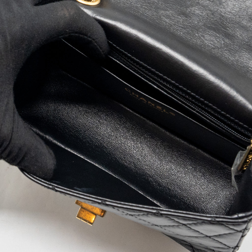CHANEL MINI 2.55 REISSUE FLAP BAG AGED CALFSKIN BLACK GHW