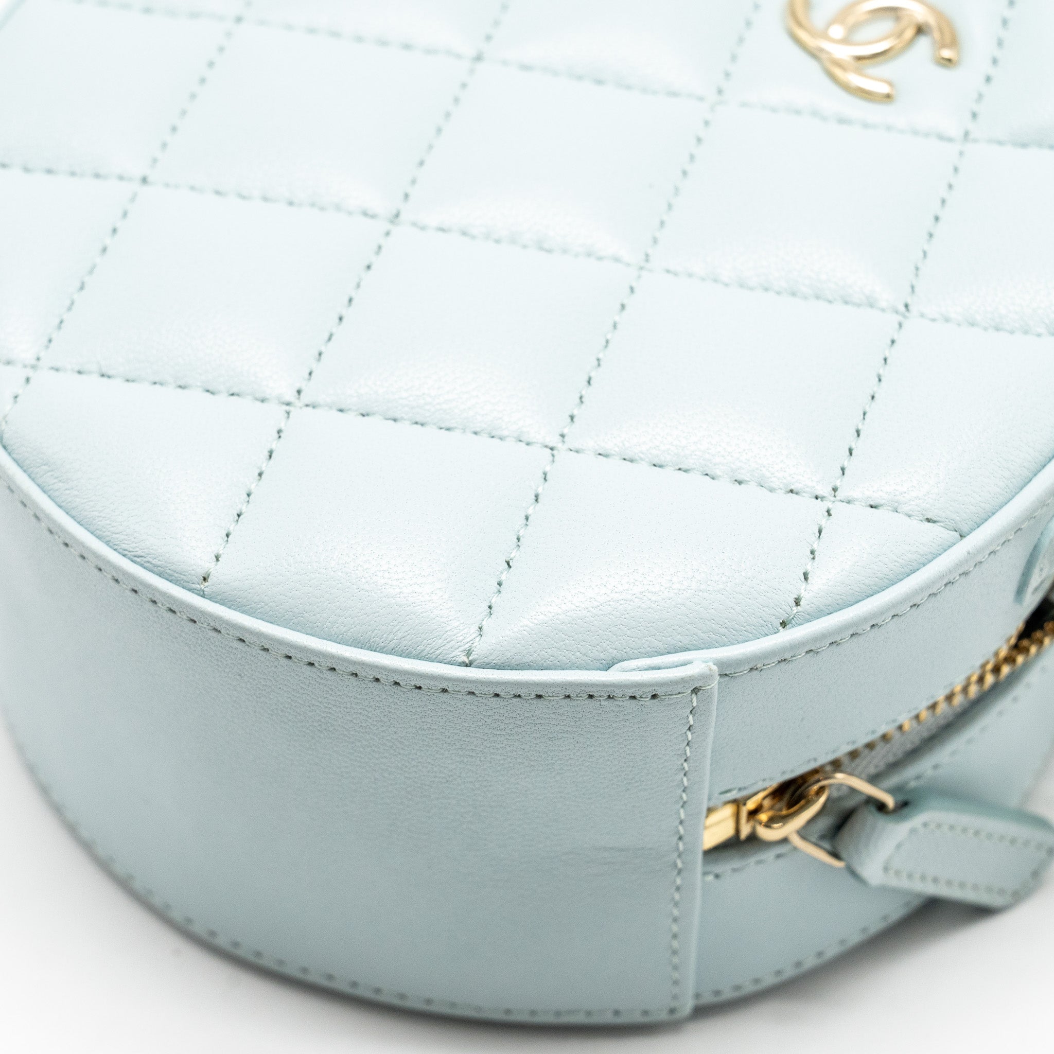 CHANEL MINI ROUND VANITY WITH RIBBON ON CHAIN LAMBSKIN LIGHT BLUE LGHW