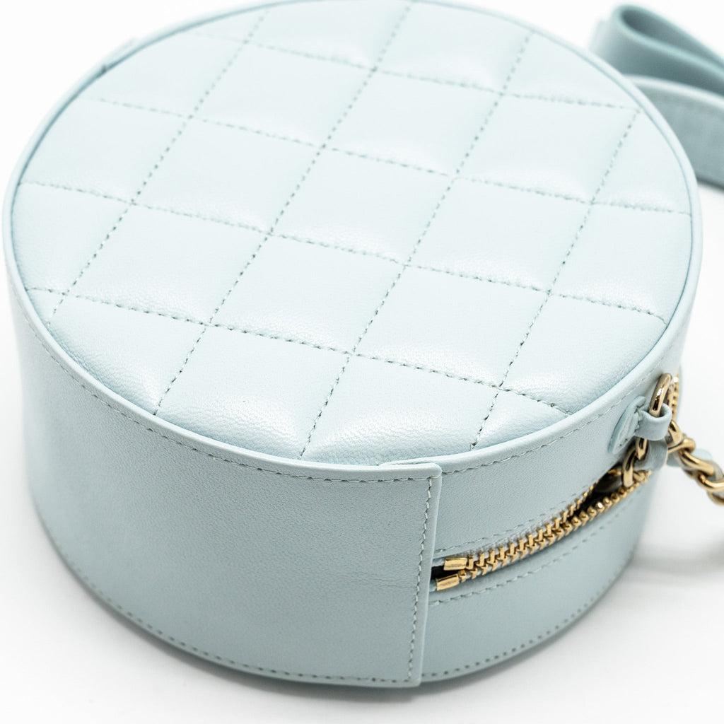 CHANEL MINI ROUND VANITY WITH RIBBON ON CHAIN LAMBSKIN LIGHT BLUE LGHW