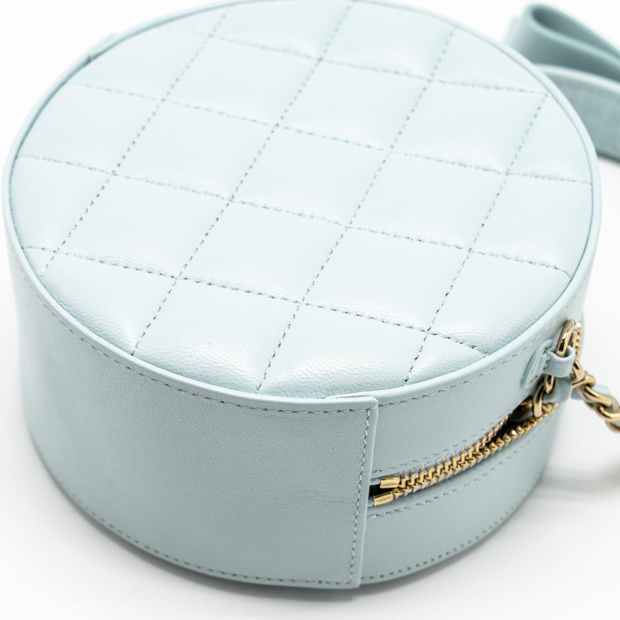 CHANEL MINI ROUND VANITY WITH RIBBON ON CHAIN LAMBSKIN LIGHT BLUE LGHW