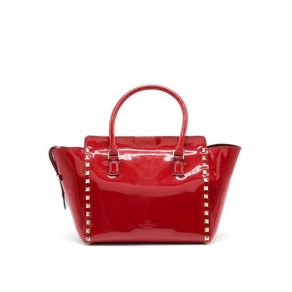 VALENTINO ROCKSTUD SMALL PAGOTA TOTE IN PATENT RED
