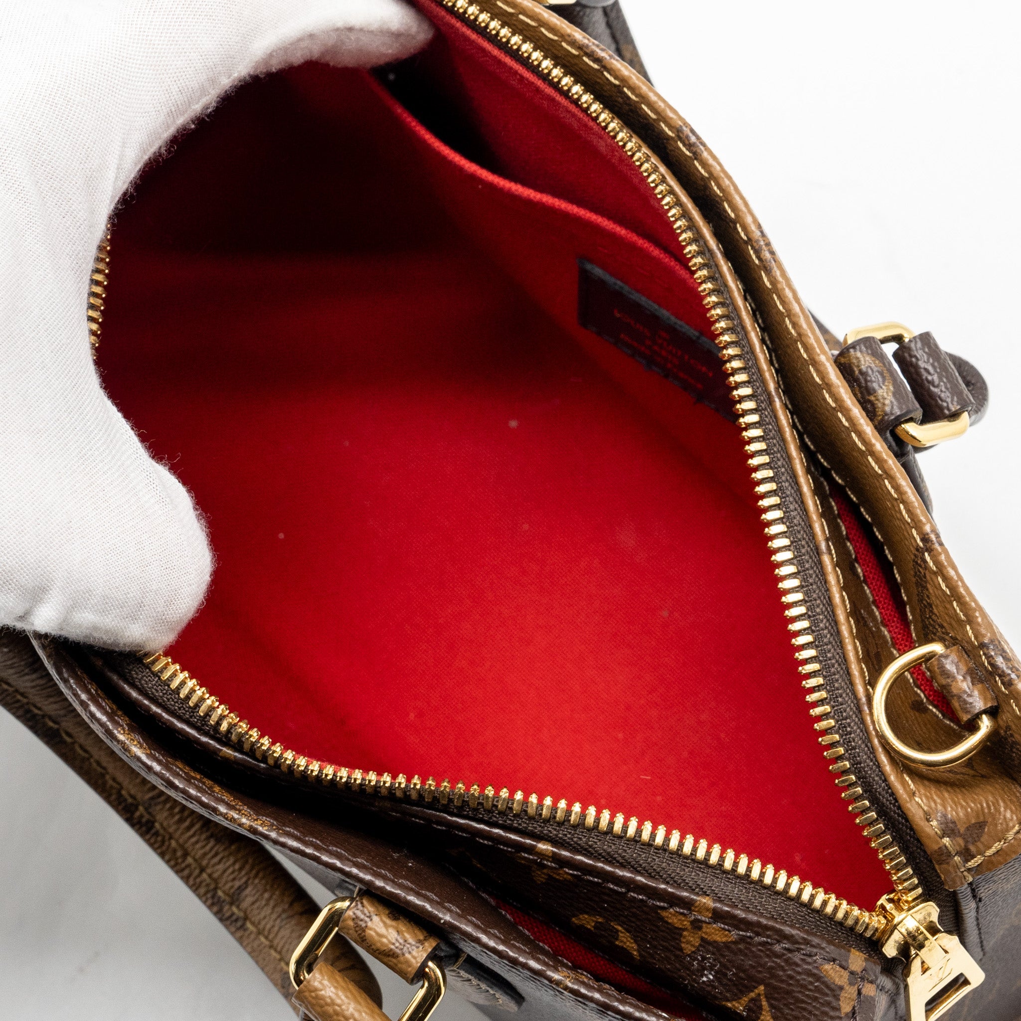 LOUIS VUITTON ONTHEGO EAST WEST MONOGRAM REVERSE GHW