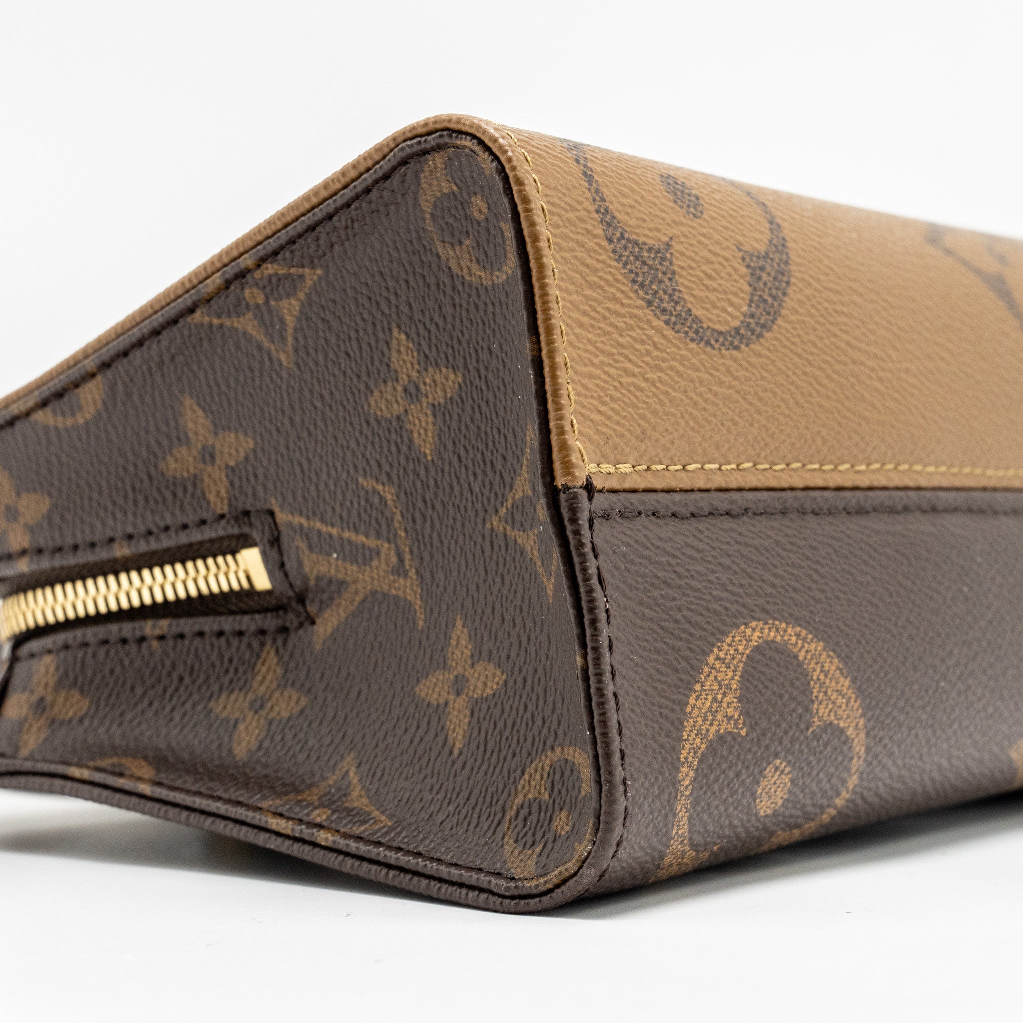 LOUIS VUITTON ONTHEGO EAST WEST MONOGRAM REVERSE GHW