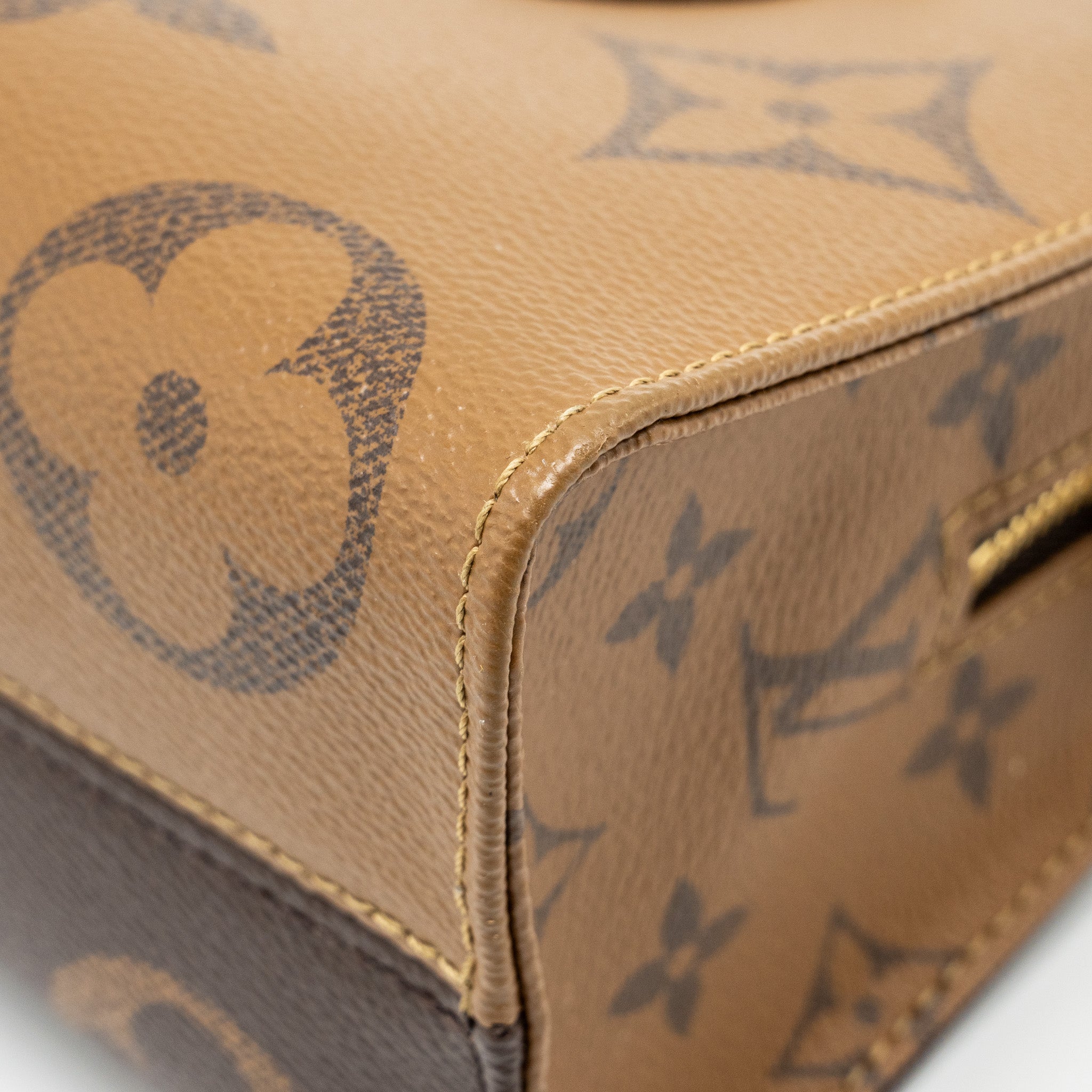 LOUIS VUITTON ONTHEGO EAST WEST MONOGRAM REVERSE GHW