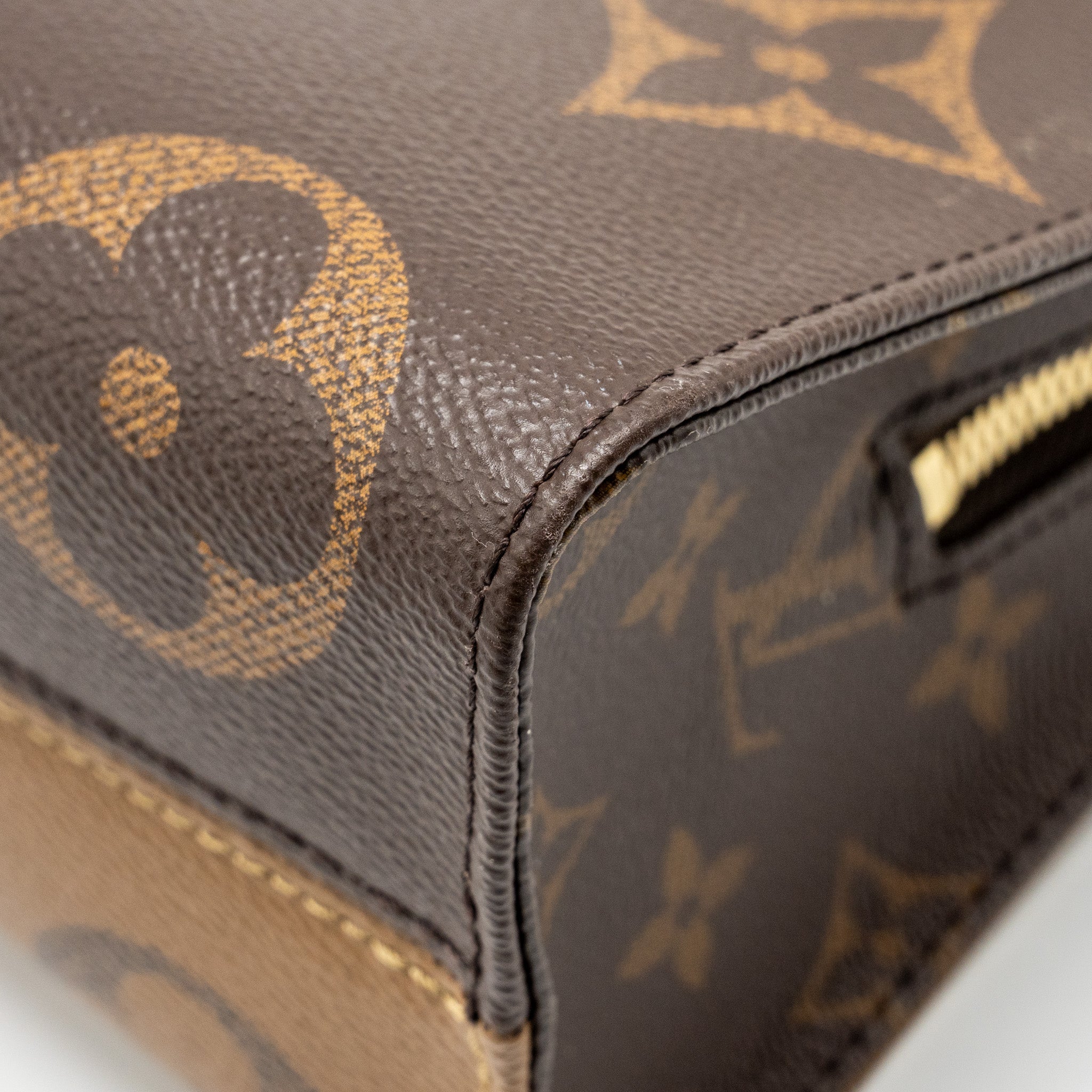 LOUIS VUITTON ONTHEGO EAST WEST MONOGRAM REVERSE GHW