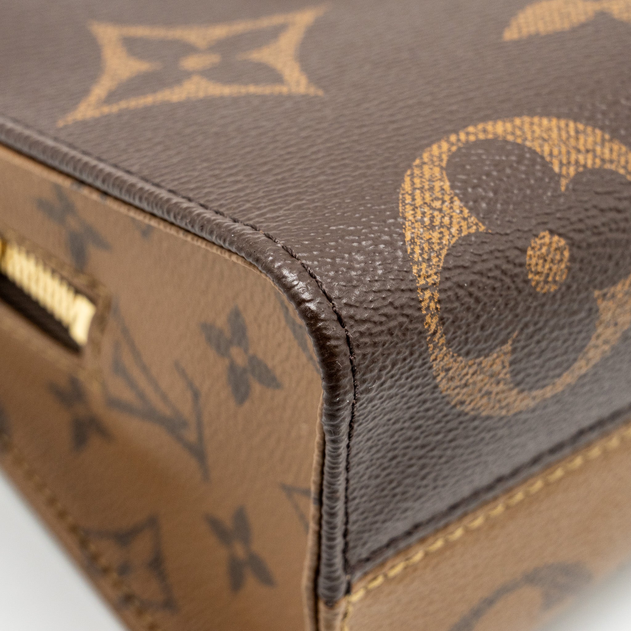 LOUIS VUITTON ONTHEGO EAST WEST MONOGRAM REVERSE GHW