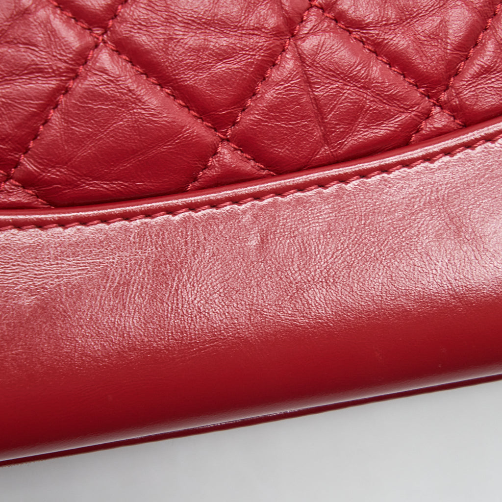 CHANEL SMALL GABRIELLE BACKPACK AGED CALFSKIN RED WITH RUTHENIUM GOLD/SLIVER HARDWARE