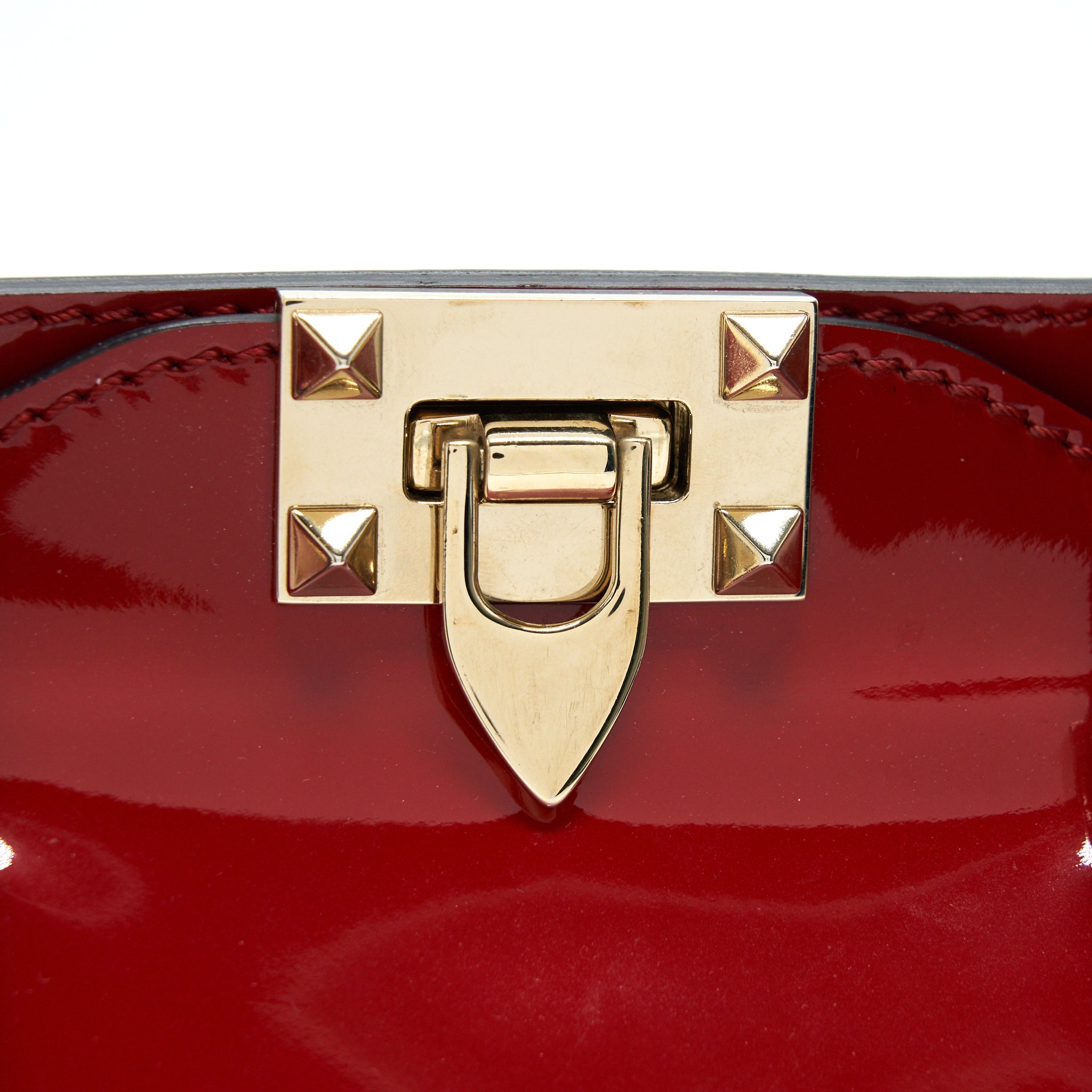 VALENTINO ROCKSTUD SMALL PAGOTA TOTE IN PATENT RED