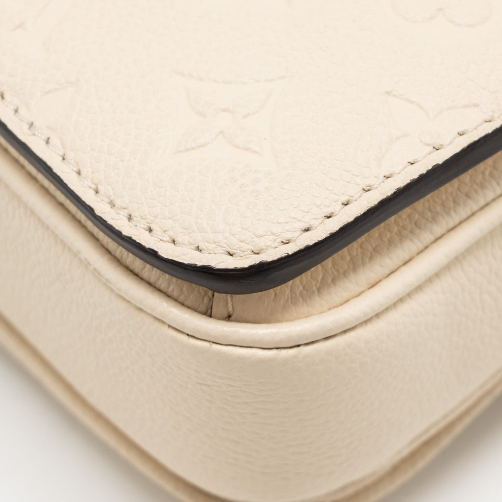 LOUIS VUITTON POCHETTE MÉTIS EAST WEST MONOGRAM EMPREINTE LEATHER CREAM GHW