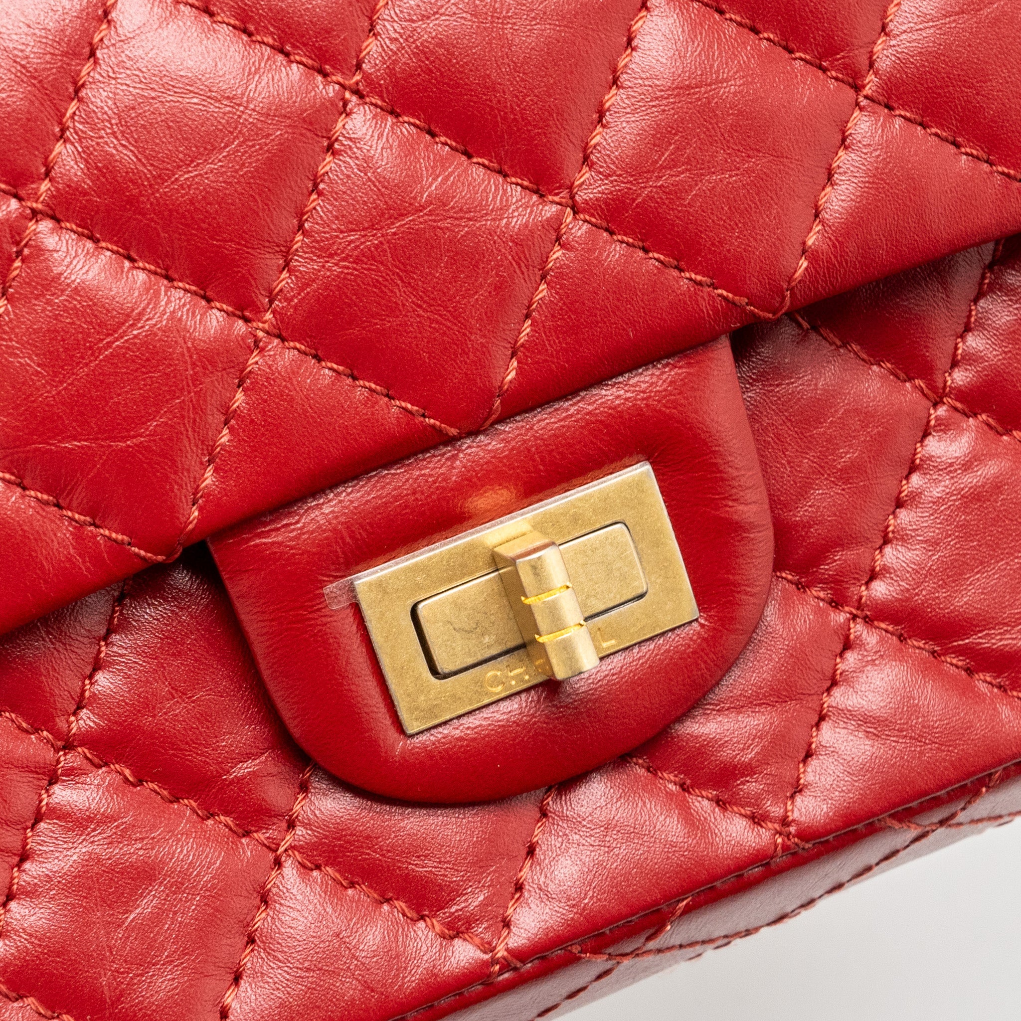 CHANEL MINI 2.55 REISSUE FLAP BAG AGED CALFSKIN RED GHW