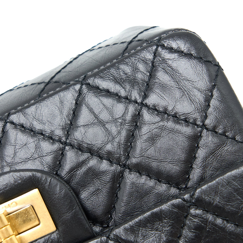 CHANEL MINI 2.55 REISSUE FLAP BAG AGED CALFSKIN BLACK BRUSHED GHW (MICROCHIP)