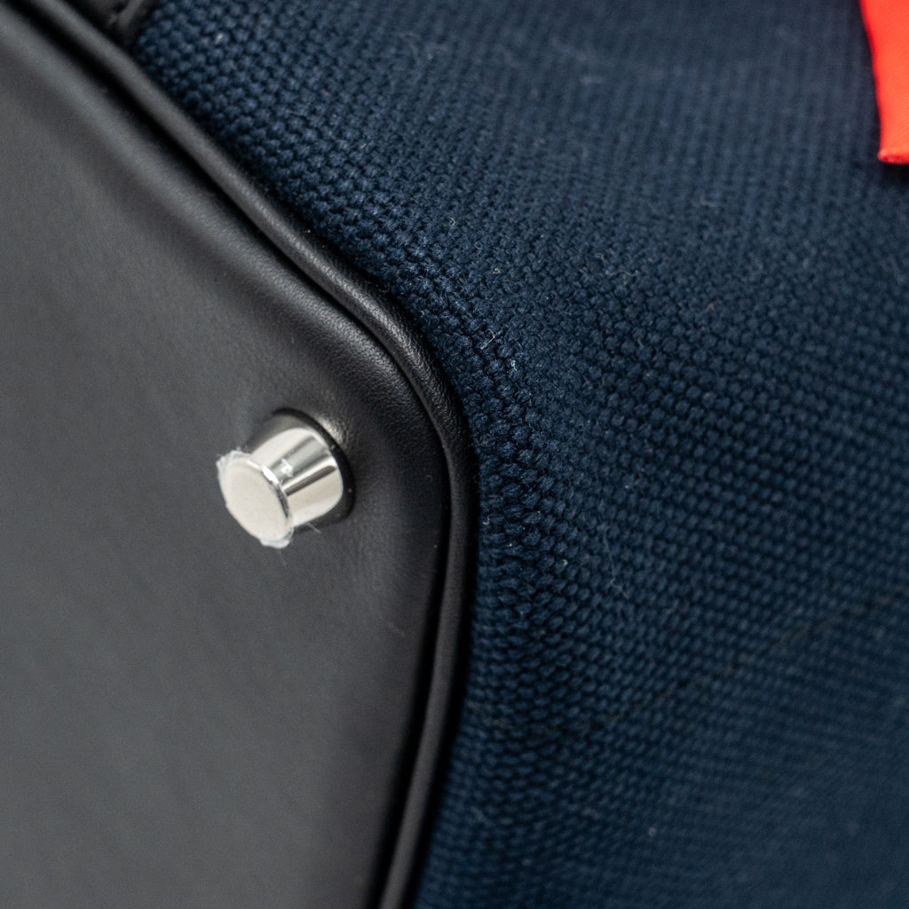 HERMES CARGO PICOTIN 18 LOCK BAG CANVAS/SWIFT BLEU MARINE/BLACK SHW