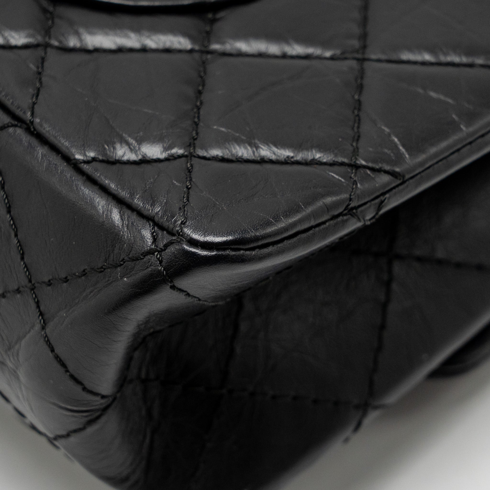 CHANEL LARGE 2.55 REISSUE FLAP BAG AGED CALFSKIN BLACK GHW
