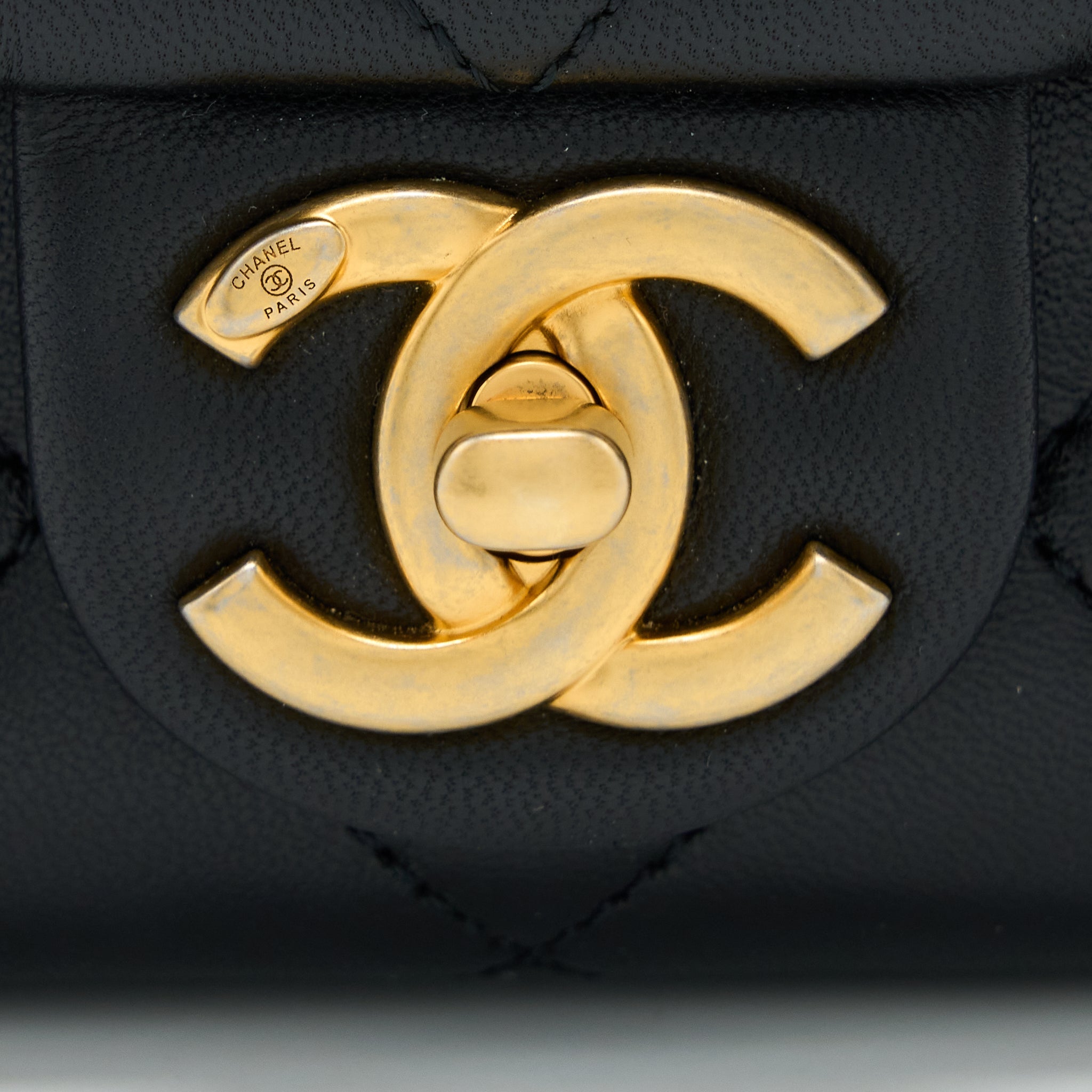 CHANEL CIRCULAR HANDLE QUILTED FLAP BAG LAMBSKIN BLACK BRUSHED GHW