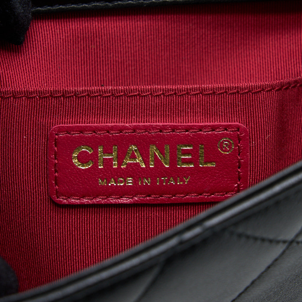 CHANEL CIRCULAR HANDLE QUILTED FLAP BAG LAMBSKIN BLACK BRUSHED GHW
