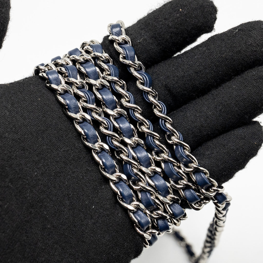 CHANEL CC QUILTED ROUND CLUTCH WITH CHAIN DENIM DARK BLUE SHW