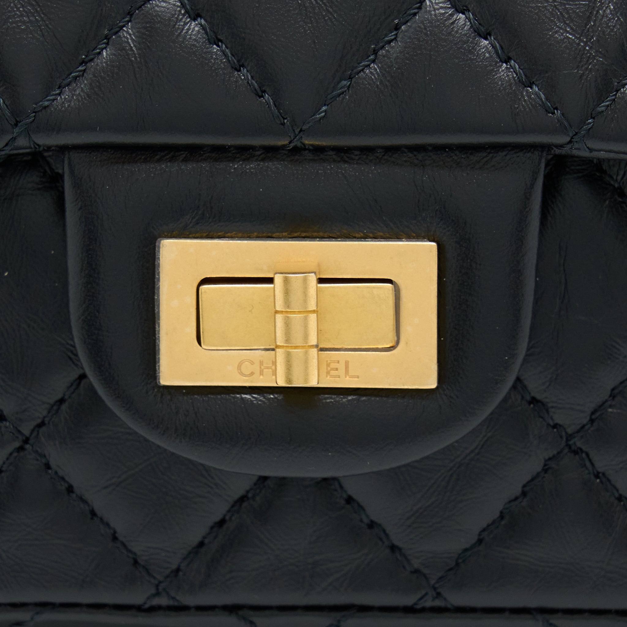 CHANEL MINI 2.55 REISSUE FLAP BAG AGED CALFSKIN BLACK BRUSHED GHW (MICROCHIP)