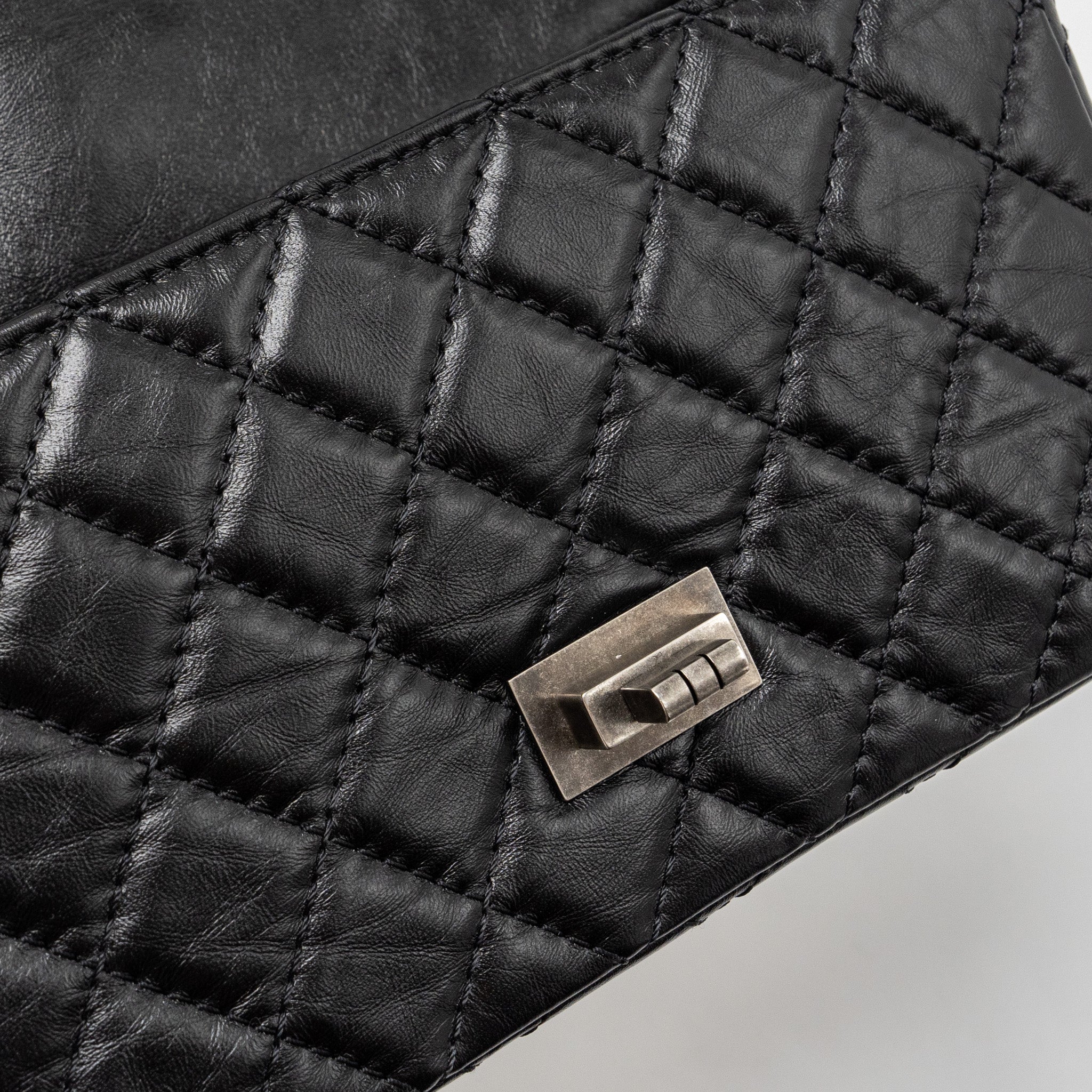 CHANEL MINI 2.55 REISSUE FLAP BAG AGED CALFSKIN BLACK RUTHENIUM HARDWARE