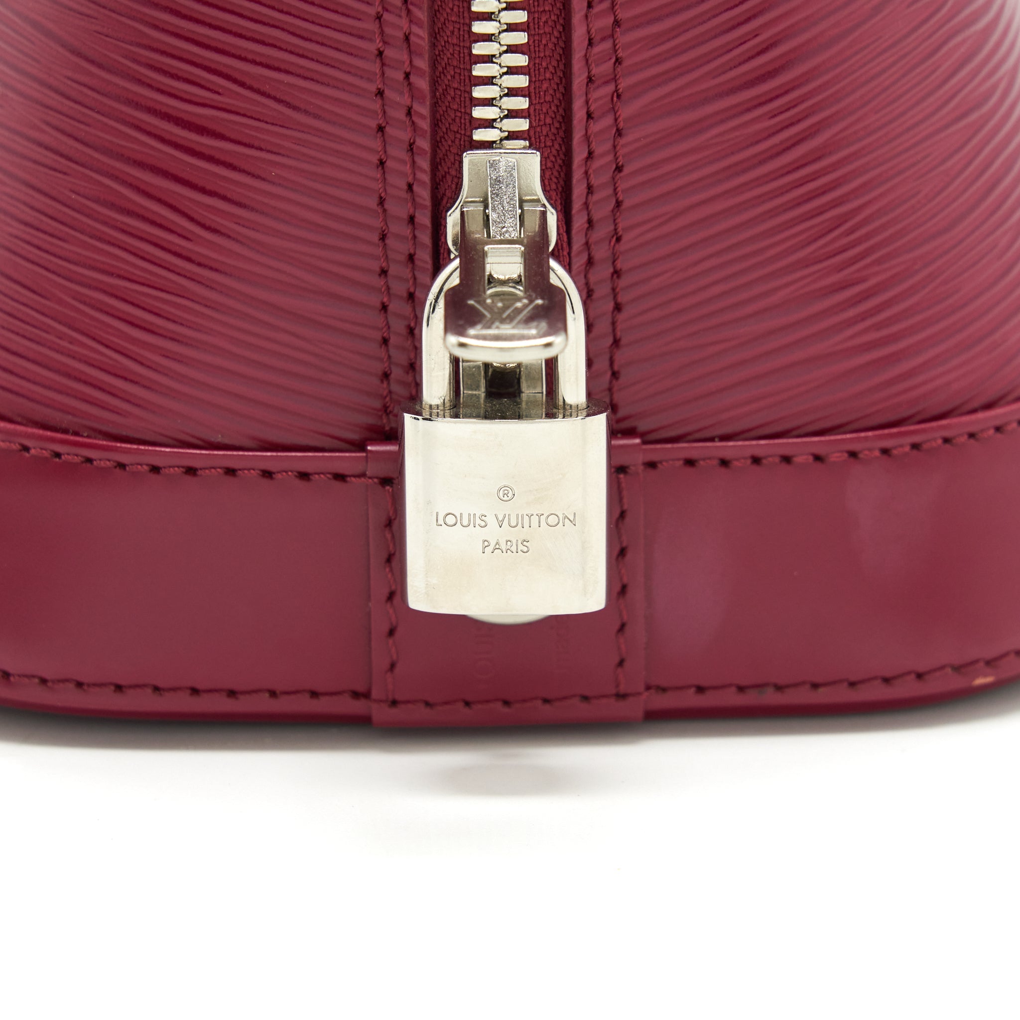 LOUIS VUITTON ALMA PM EPI DARK RED SHW WITH INITIAL J.Y ON KEY TAG