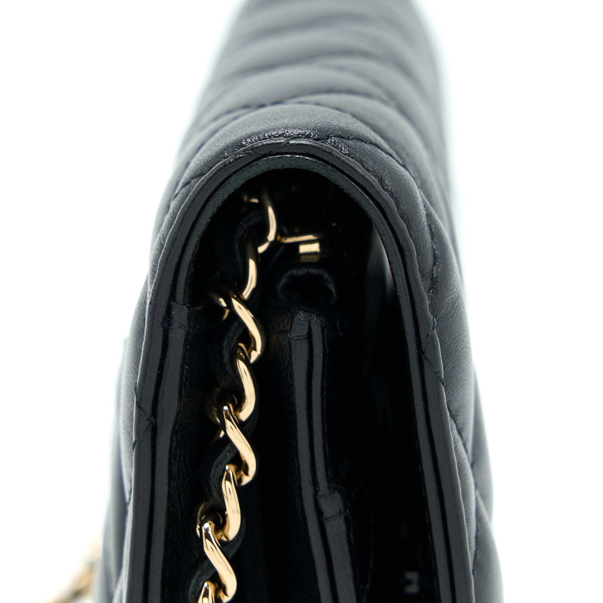 CHANEL QUILTED WALLET ON CHAIN WITH CAMELLIA CHAIN LAMBSKIN BLACK LGHW