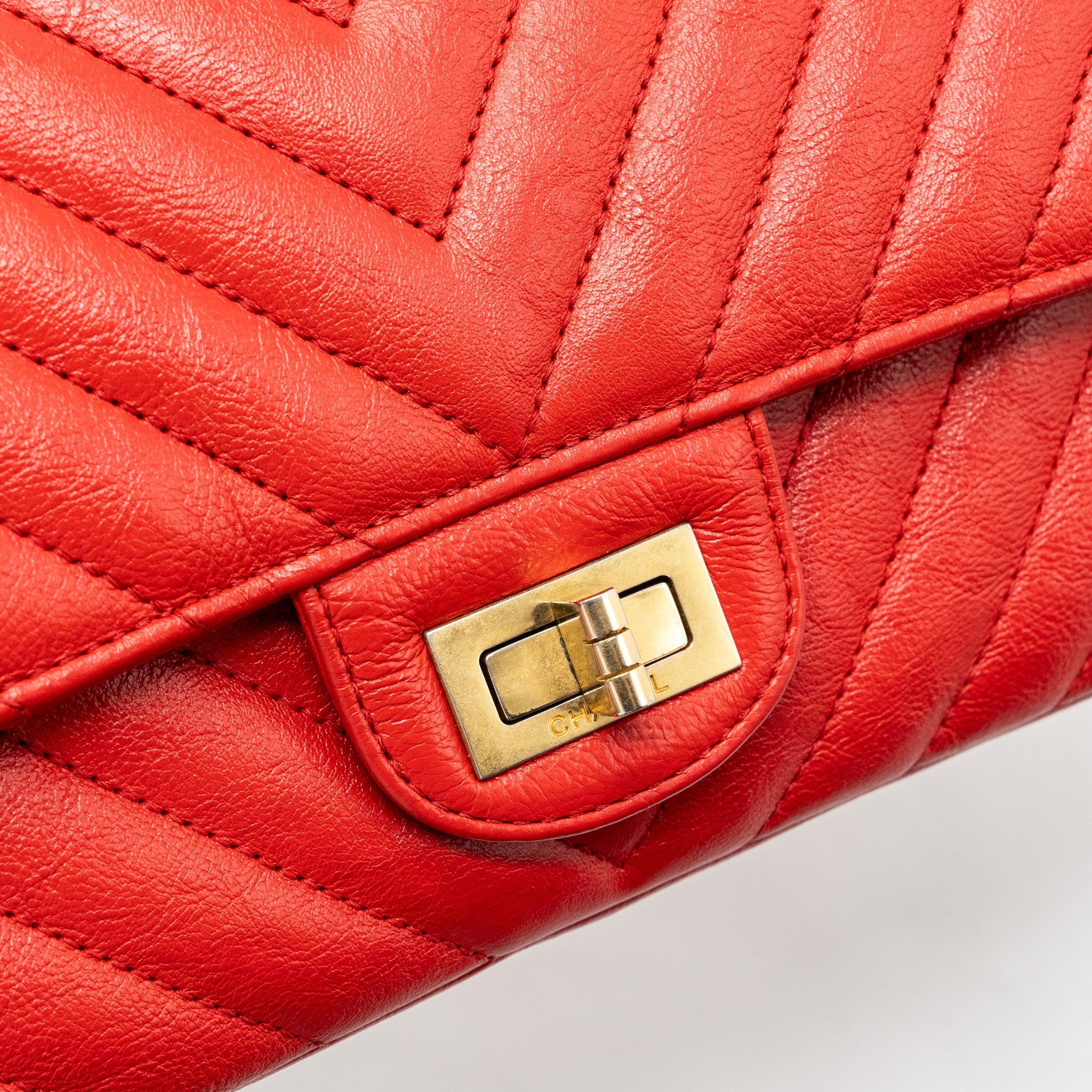 CHANEL SMALL 2.55 REISSUE FLAP BAG CHEVRON CALFSKIN RED GHW