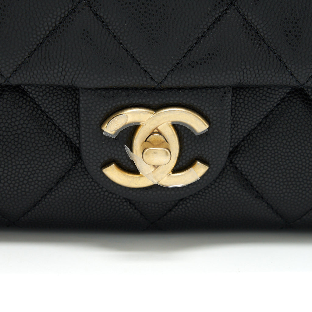 CHANEL 22A SMALL FLAP BAG WITH BUTTON ON CHAINS CAVIAR BLACK BRUSHED GHW