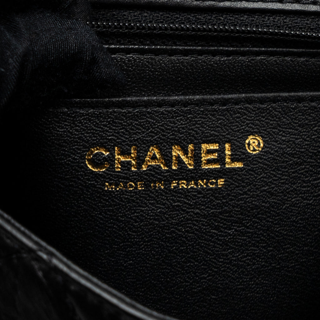 CHANEL MINI 2.55 REISSUE FLAP BAG AGED CALFSKIN BLACK GHW