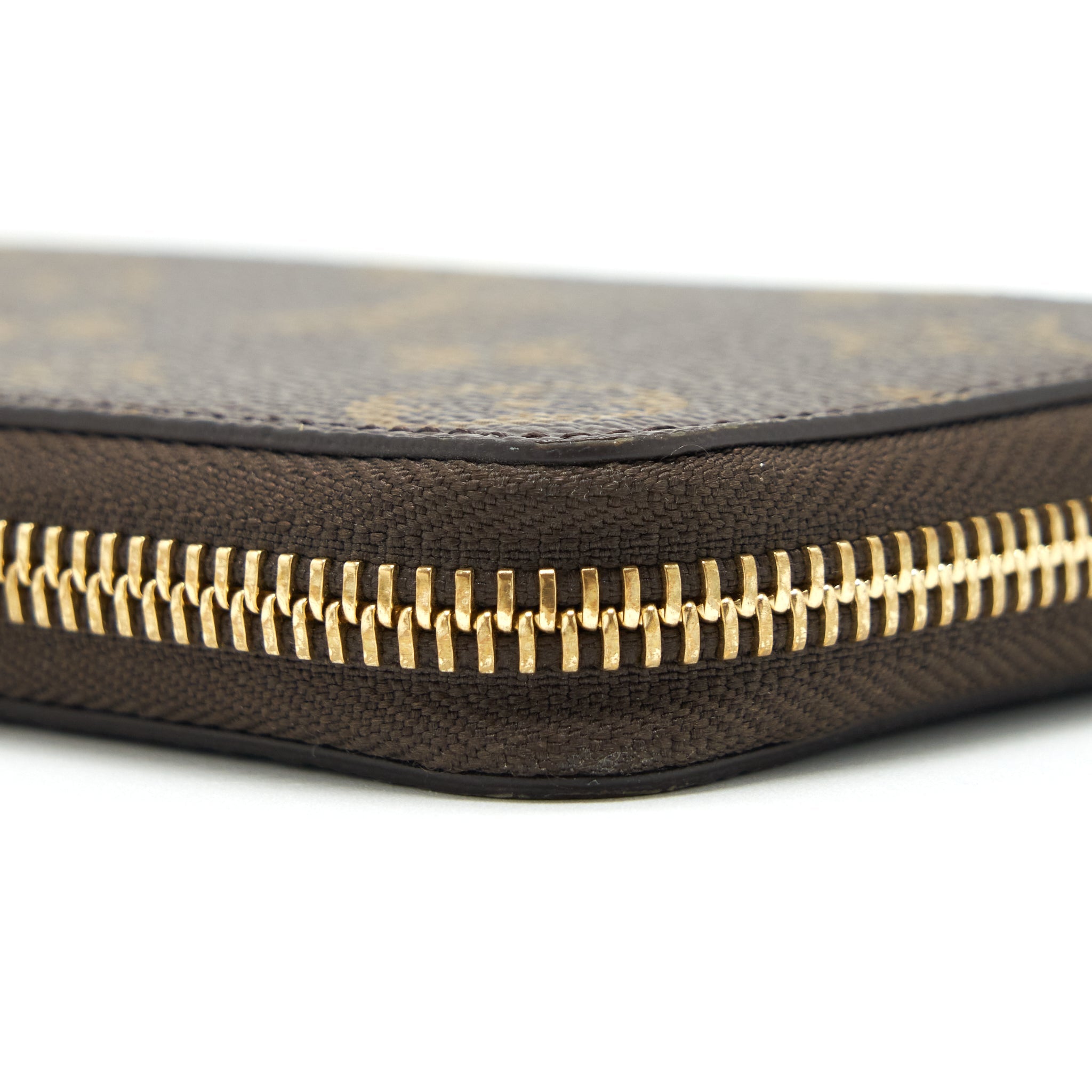 LOUIS VUITTON CLEMENCE LONG WALLET MONOGRAM CANVAS FUCHSIA