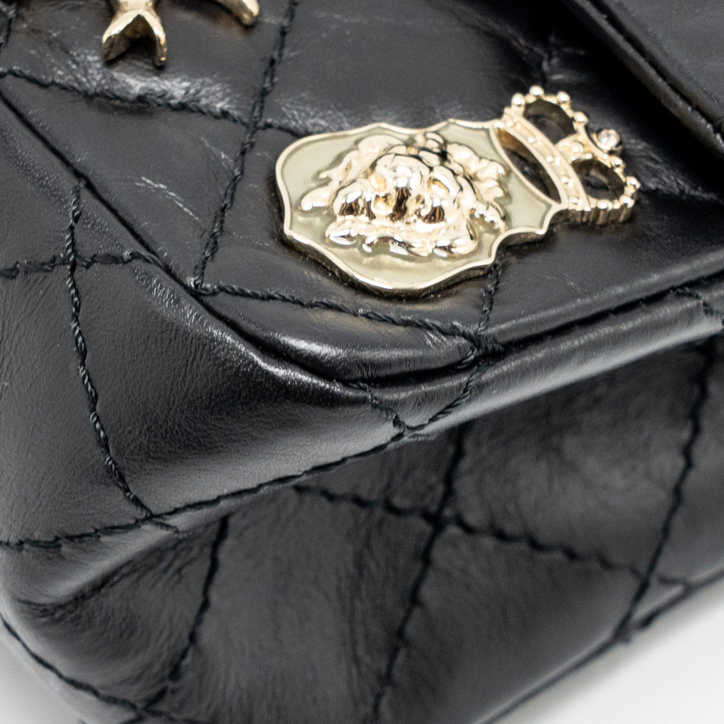 CHANEL MINI 2.55 REISSUE FLAP BAG LUCKY CHARMS AGED CALFSKIN BLACK GHW