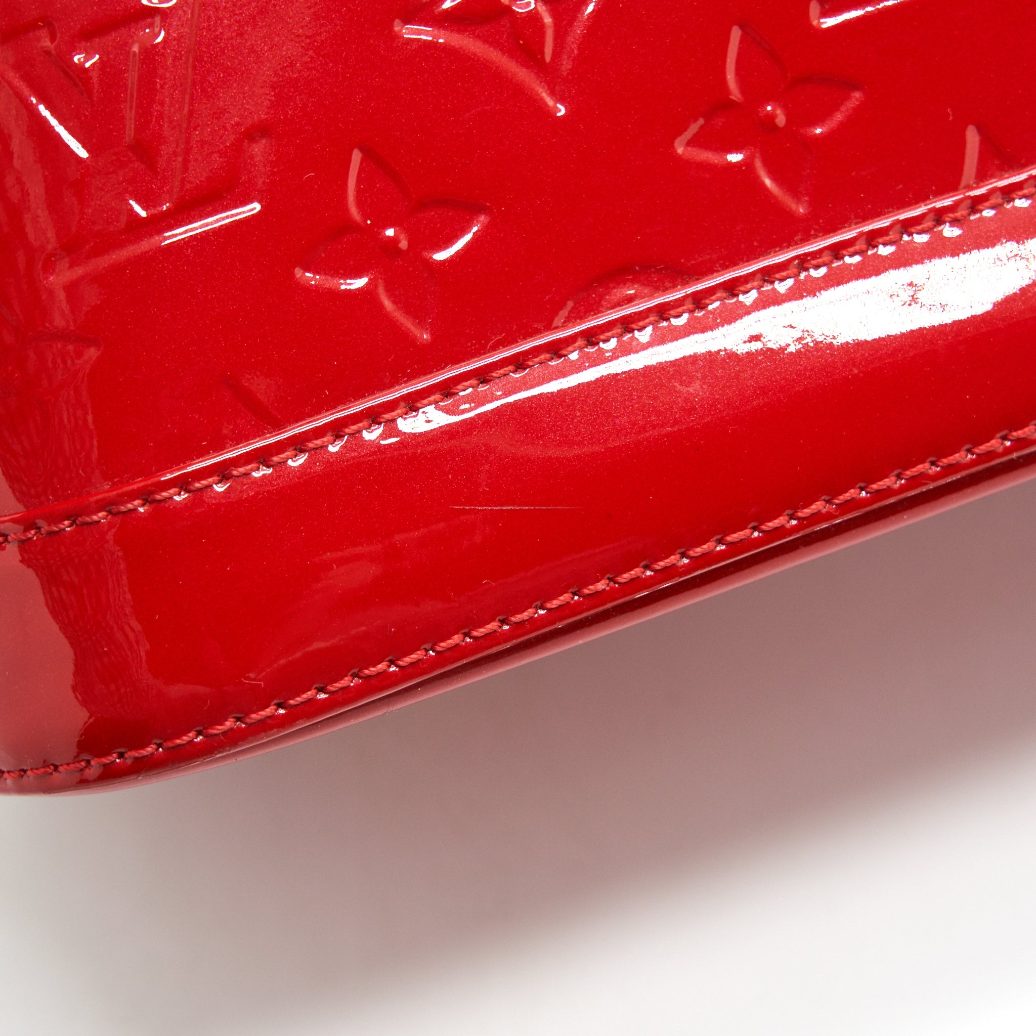 LOUIS VUITTON ALMA BB IN PATENT LEATHER RED