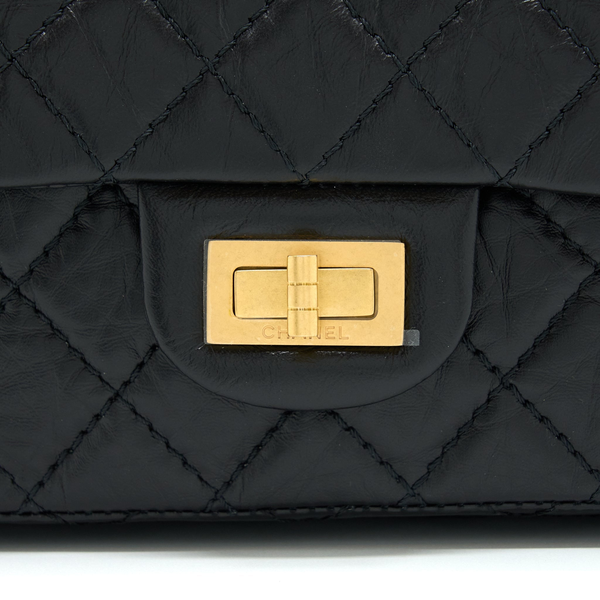 CHANEL MINI 2.55 REISSUE FLAP BAG AGED CALFSKIN BLACK BRUSHED GHW (MICROCHIP)