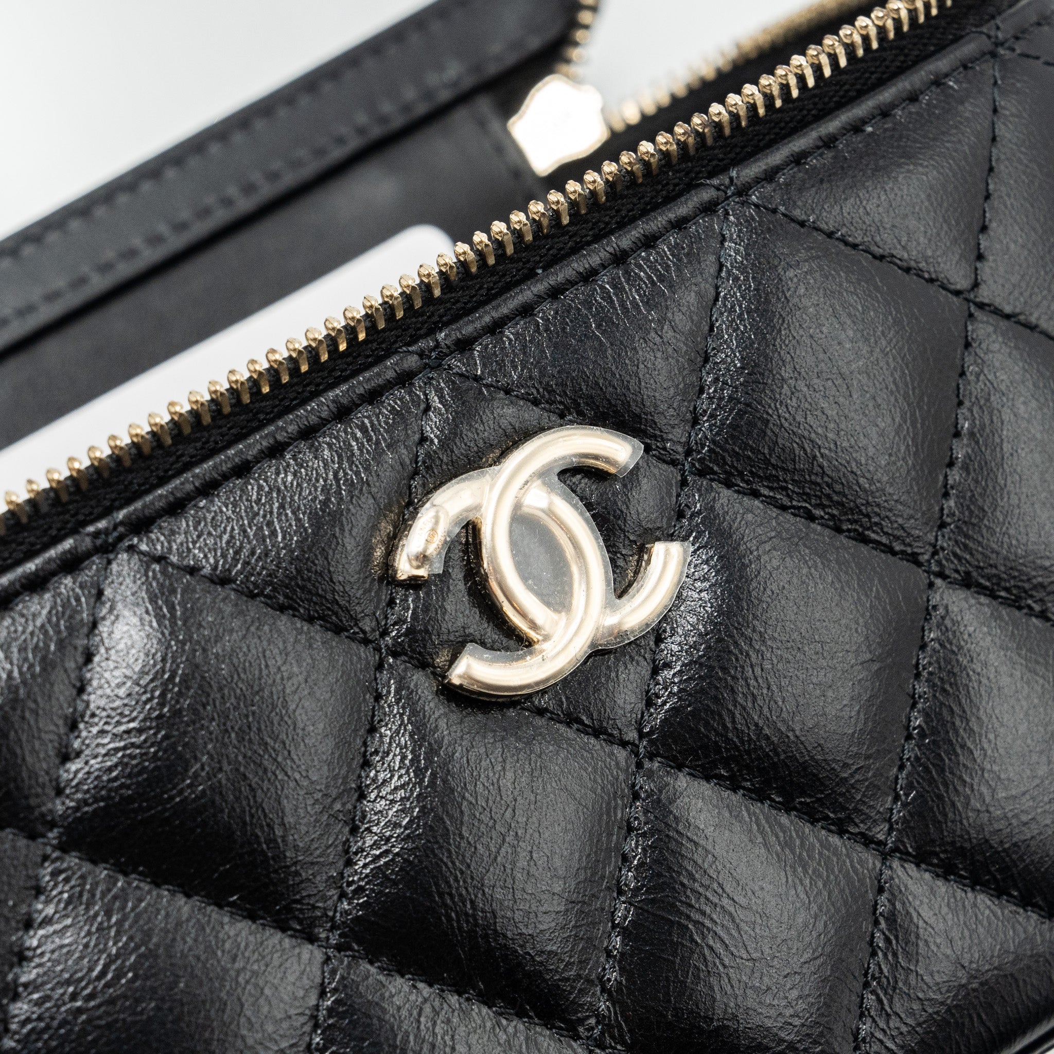 CHANEL LONG VANITY CASE WITH CHARMS CHAIN CALFSKIN BLACK LGHW (MICROCHIP)