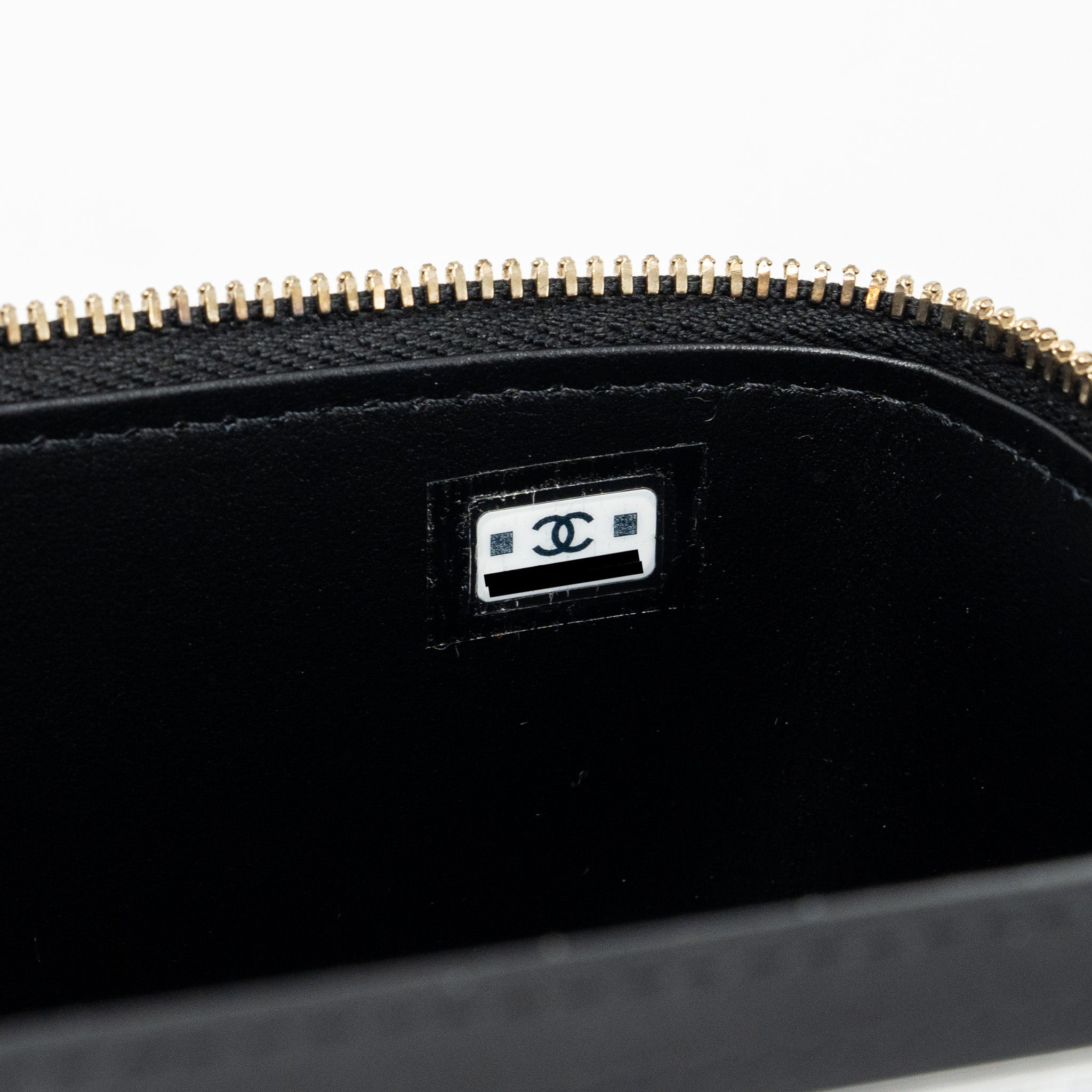 CHANEL LONG VANITY CASE WITH CHARMS CHAIN CALFSKIN BLACK LGHW (MICROCHIP)