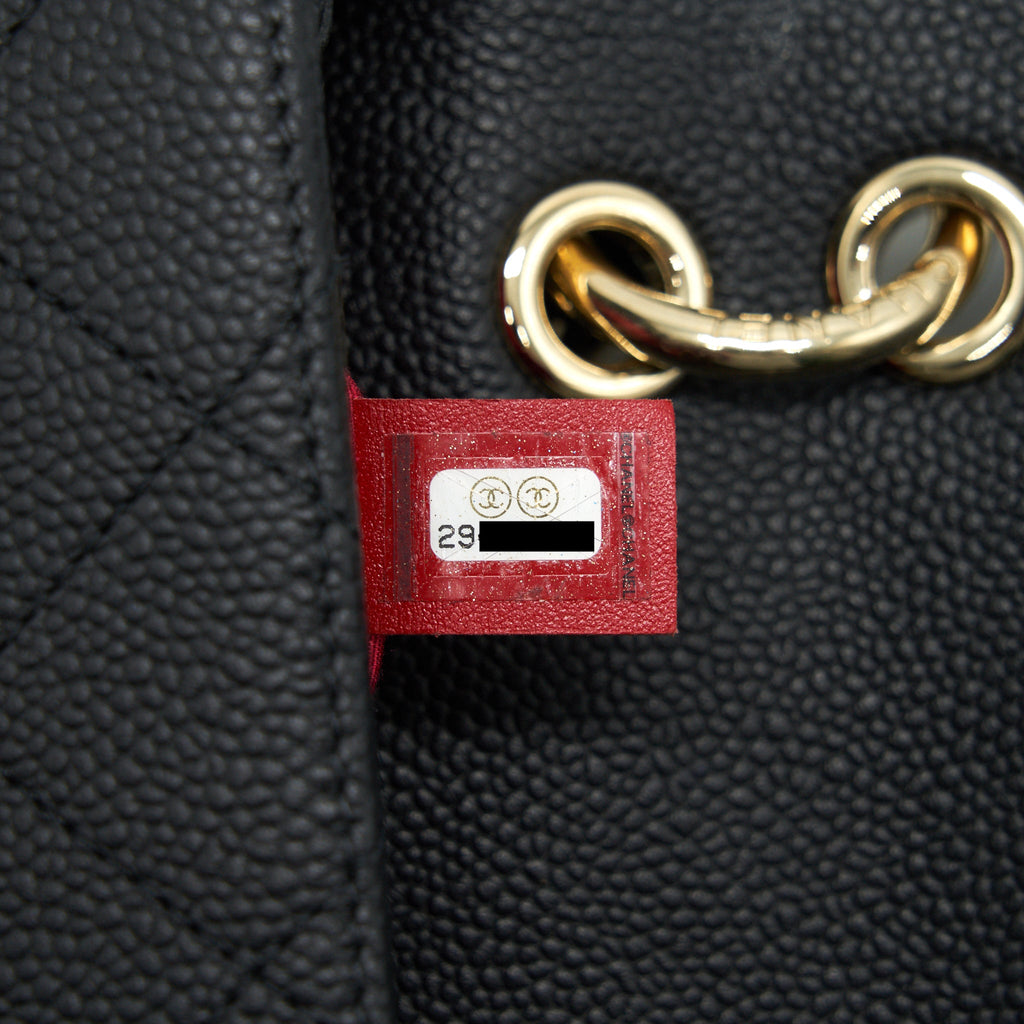 CHANEL CAVIAR QUILTED FLAP BAG WITH HANDLE AND CHAIN BLACK LGHW