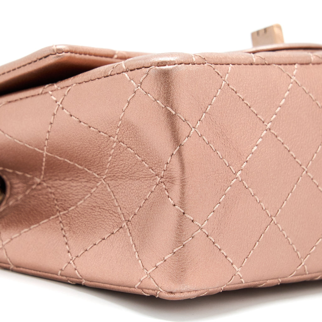 CHANEL MINI 2.55 REISSUE FLAP BAG CALFSKIN METALLIC PINK BRUSHED GOLD (MICROCHIP)