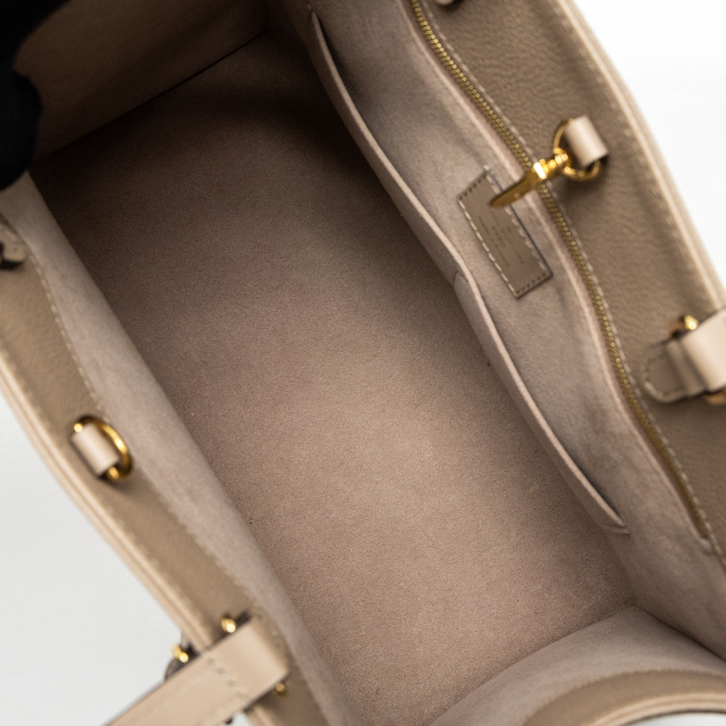 LOUIS VUITTON ON THE GO MM MONOGRAM EMPREINTE TOURTERELLE GHW