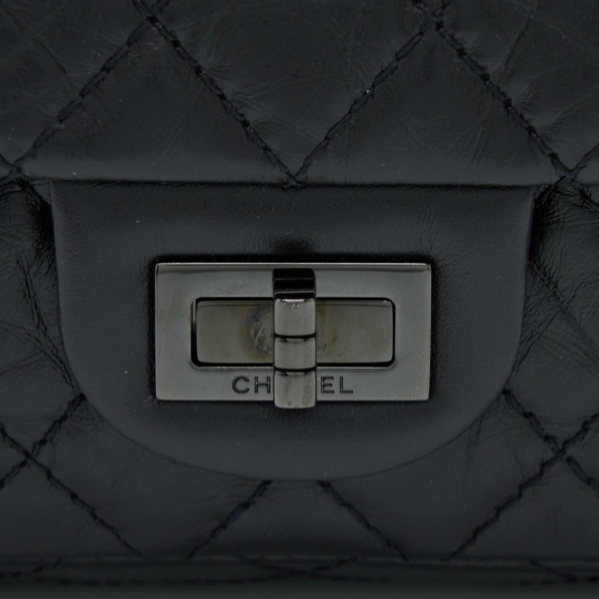 CHANEL SMALL 2.55 REISSUE FLAP BAG AGED CALFSKIN SO BLACK WITH BLACK HARDWARE (MICROCHIP)